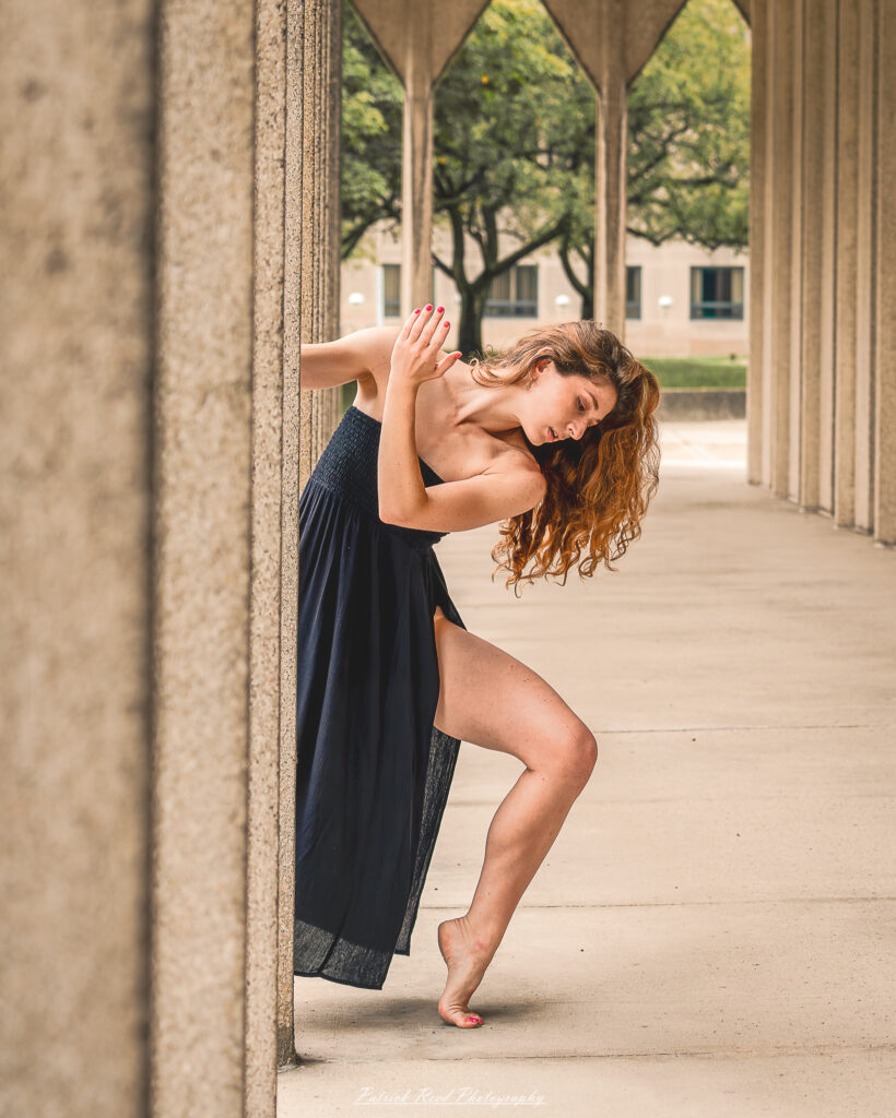 Portrait of a dancer captured on July 20, 2025, performing a graceful pose on the Wayne State University campus in Detroit.