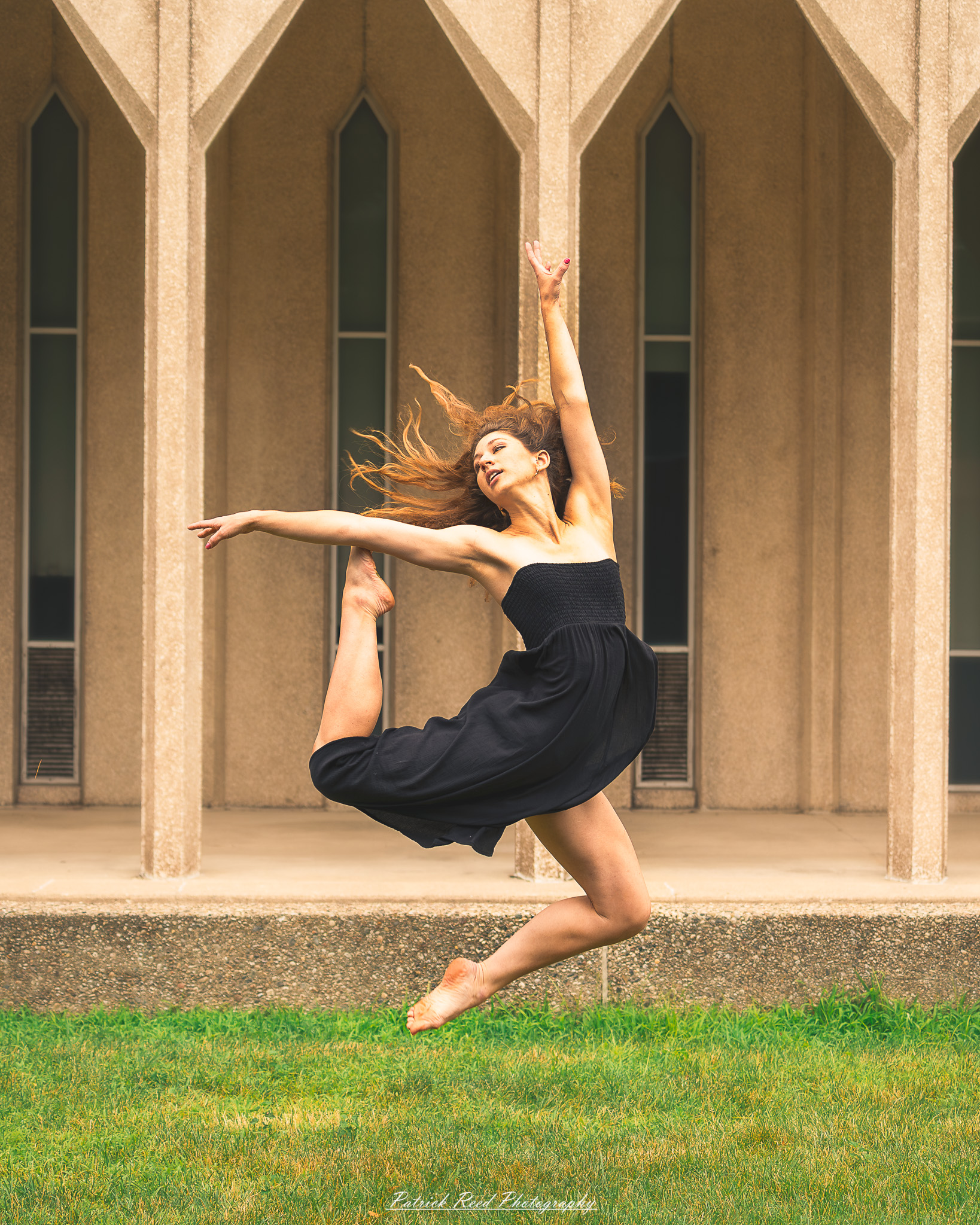 Portrait of a dancer captured on July 20, 2025, performing a graceful pose on the Wayne State University campus in Detroit.