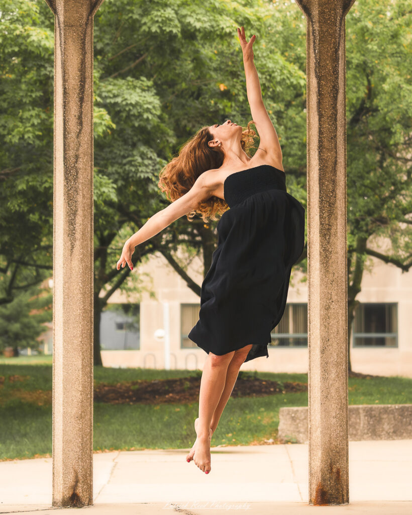 Portrait of a dancer captured on July 20, 2025, performing a graceful pose on the Wayne State University campus in Detroit.