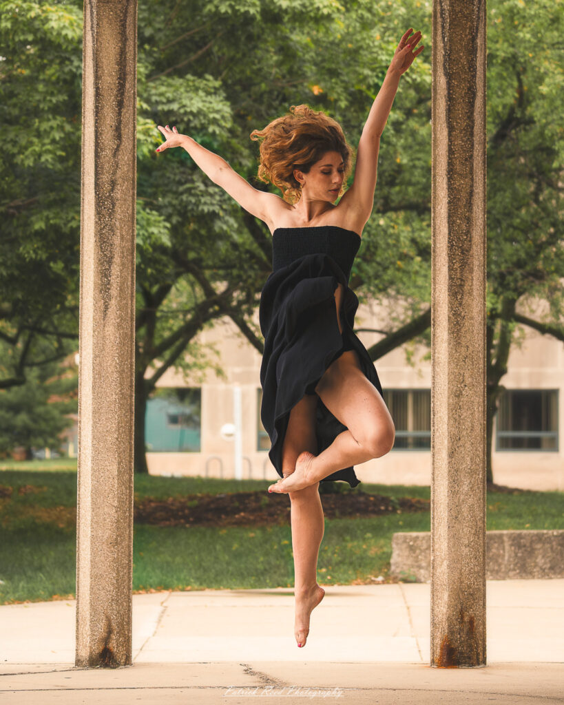 Portrait of a dancer captured on July 20, 2025, performing a graceful pose on the Wayne State University campus in Detroit.