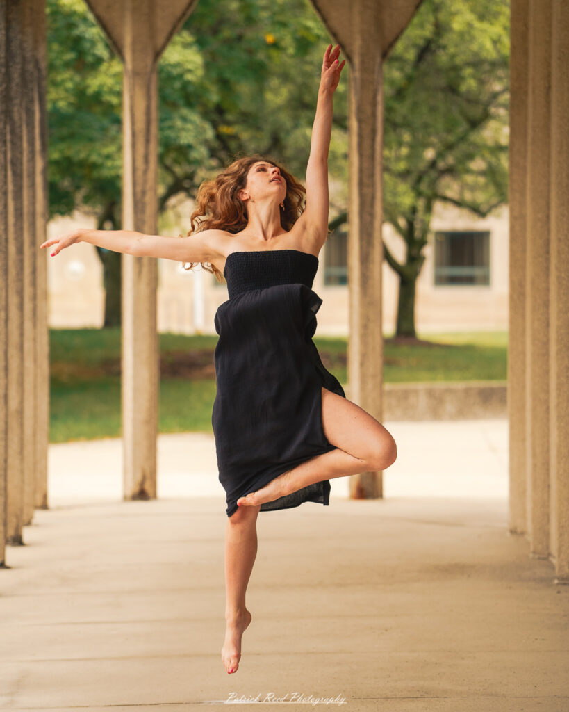 Portrait of a dancer captured on July 20, 2025, performing a graceful pose on the Wayne State University campus in Detroit.
