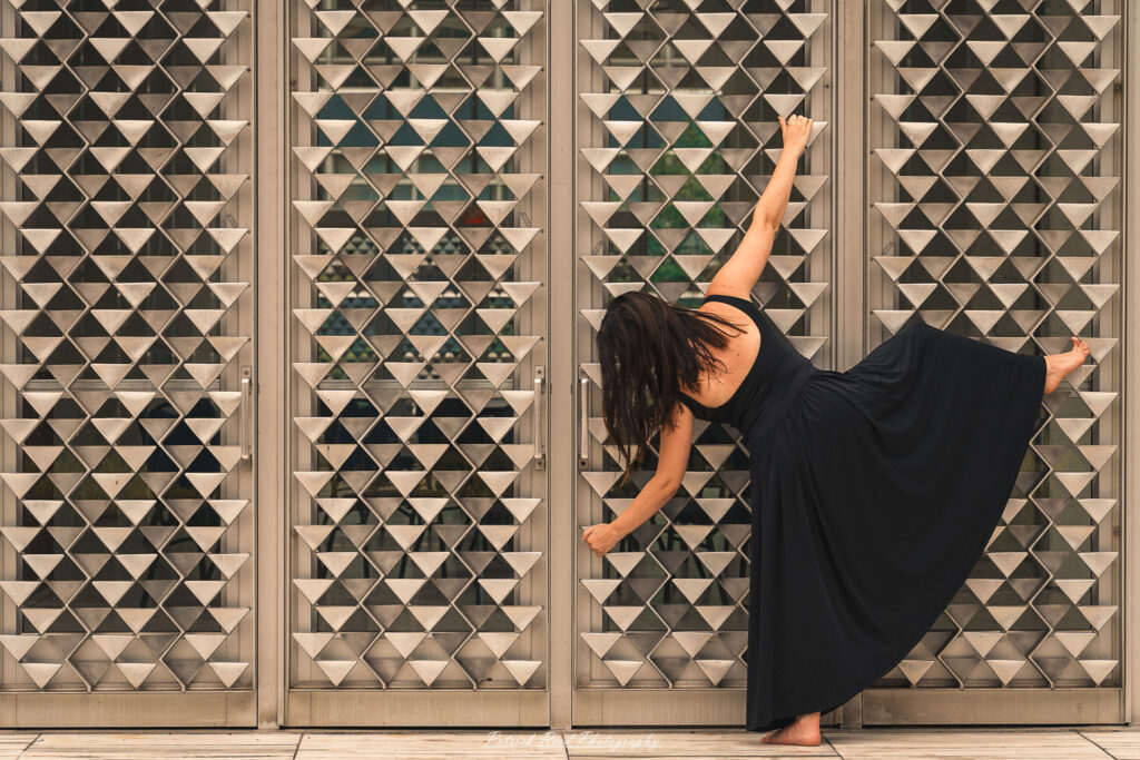 Portrait of a dancer captured on July 20, 2025, performing a graceful pose on the Wayne State University campus in Detroit.