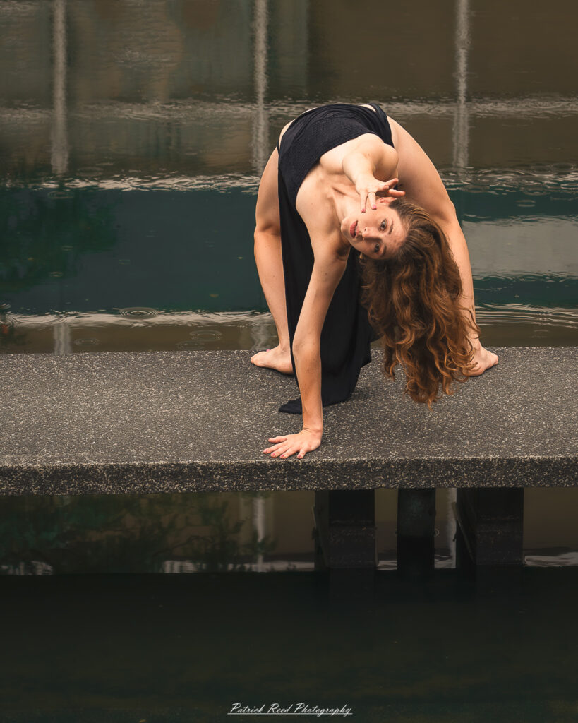 Portrait of a dancer captured on July 20, 2025, performing a graceful pose on the Wayne State University campus in Detroit.