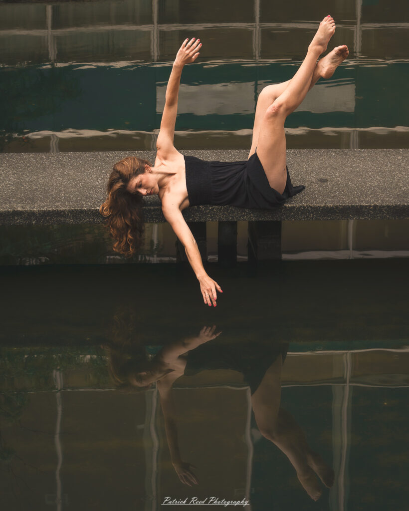 Portrait of a dancer captured on July 20, 2025, performing a graceful pose on the Wayne State University campus in Detroit.