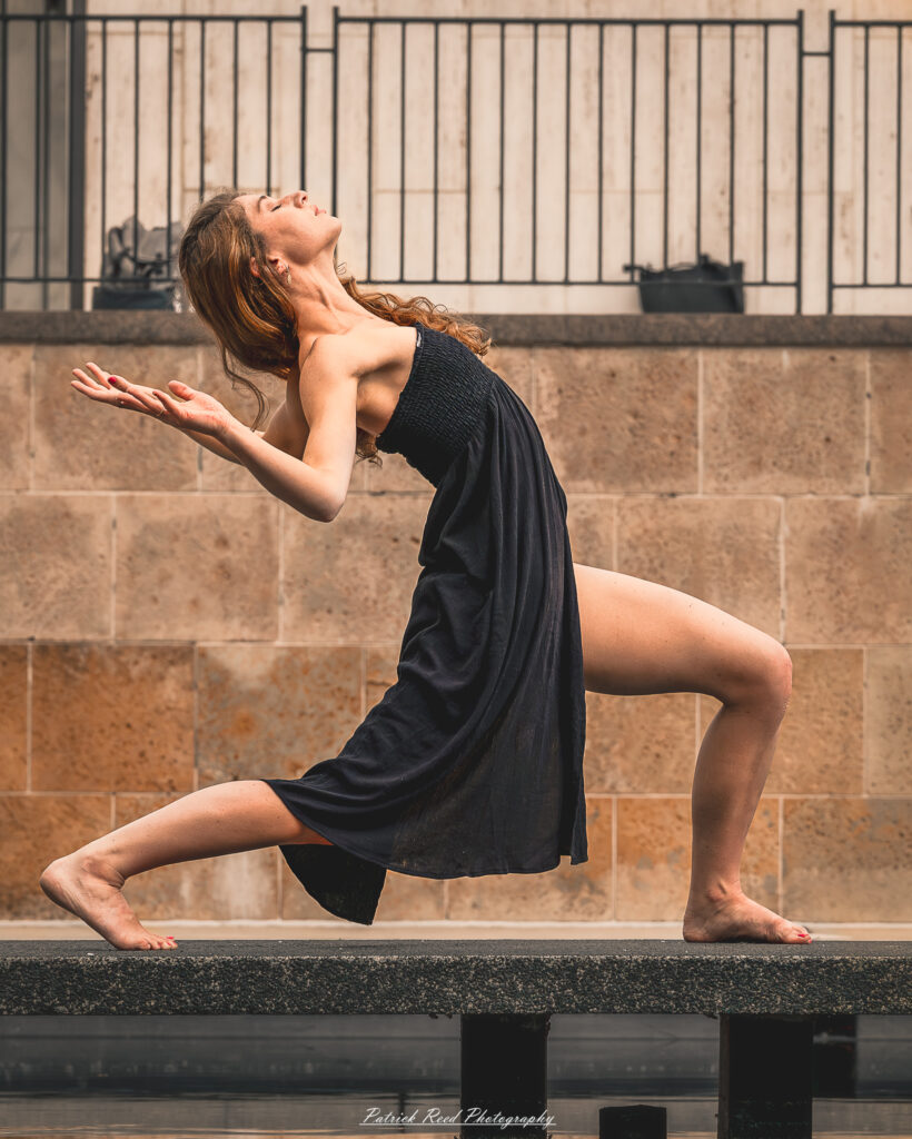Portrait of a dancer captured on July 20, 2025, performing a graceful pose on the Wayne State University campus in Detroit.