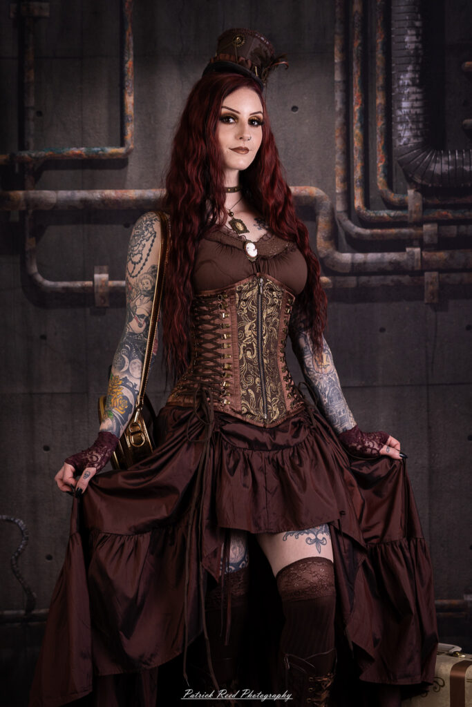 Portrait of a steampunk model named Minerva, taken on July 9, 2025. She is dressed in vintage-inspired futuristic attire with detailed accessories, capturing the essence of steampunk fashion.