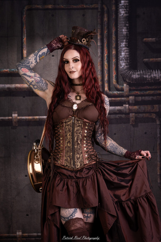 Portrait of a steampunk model named Minerva, taken on July 9, 2025. She is dressed in vintage-inspired futuristic attire with detailed accessories, capturing the essence of steampunk fashion.