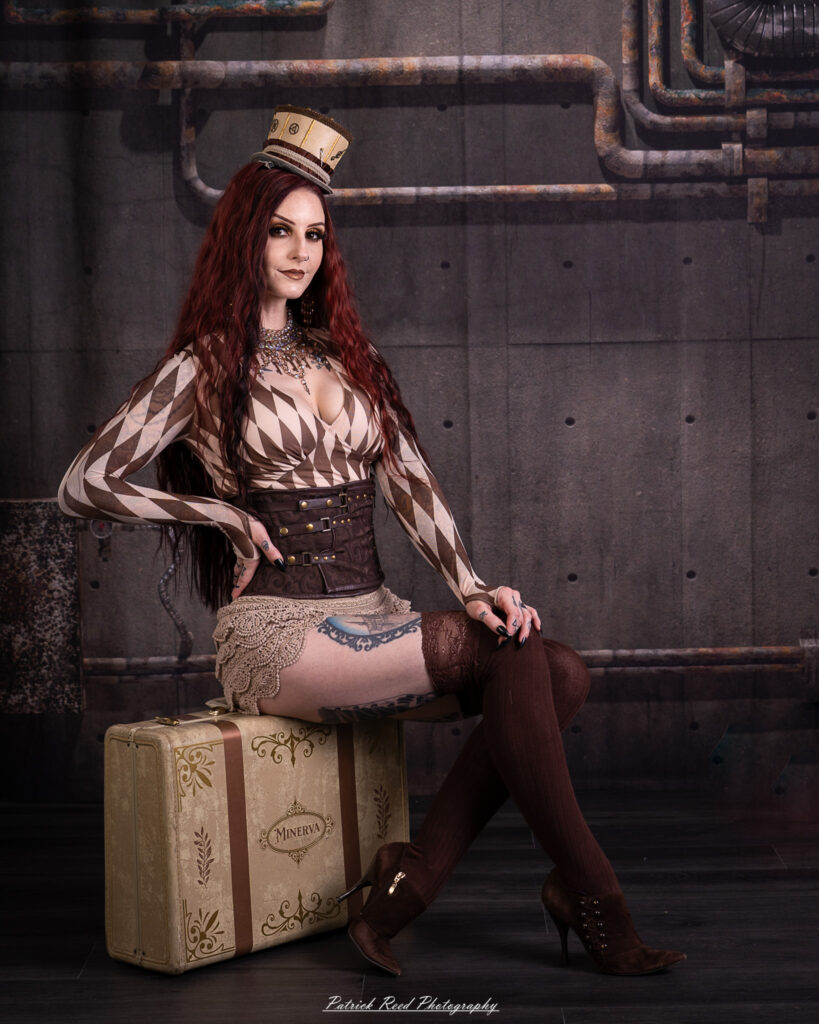 Portrait of a steampunk model named Minerva, taken on July 9, 2025. She is dressed in vintage-inspired futuristic attire with detailed accessories, capturing the essence of steampunk fashion.