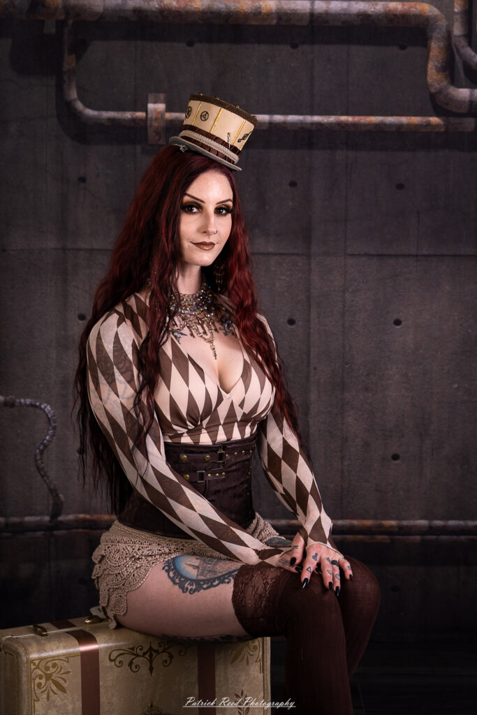 Portrait of a steampunk model named Minerva, taken on July 9, 2025. She is dressed in vintage-inspired futuristic attire with detailed accessories, capturing the essence of steampunk fashion.