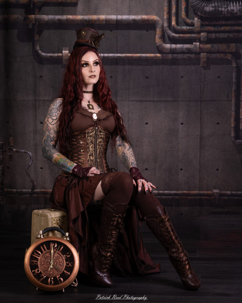 Portrait of a steampunk model named Minerva, taken on July 9, 2025. She is dressed in vintage-inspired futuristic attire with detailed accessories, capturing the essence of steampunk fashion.