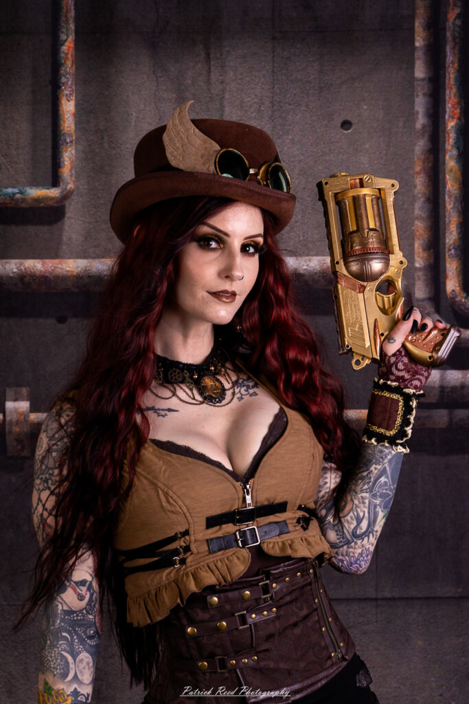 Portrait of a steampunk model named Minerva, taken on July 9, 2025. She is dressed in vintage-inspired futuristic attire with detailed accessories, capturing the essence of steampunk fashion.