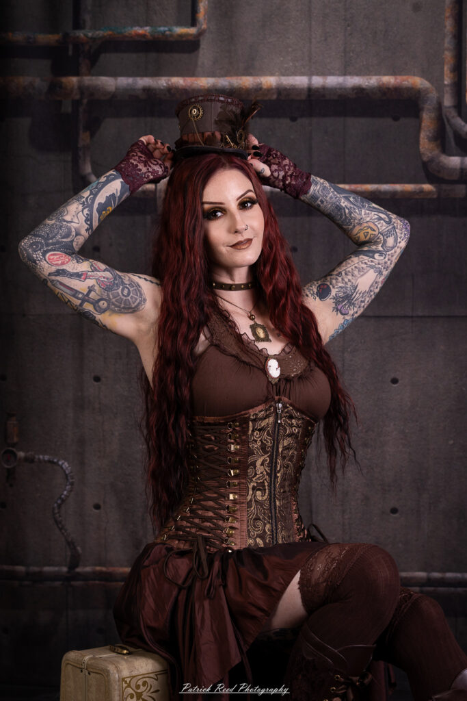 Portrait of a steampunk model named Minerva, taken on July 9, 2025. She is dressed in vintage-inspired futuristic attire with detailed accessories, capturing the essence of steampunk fashion.