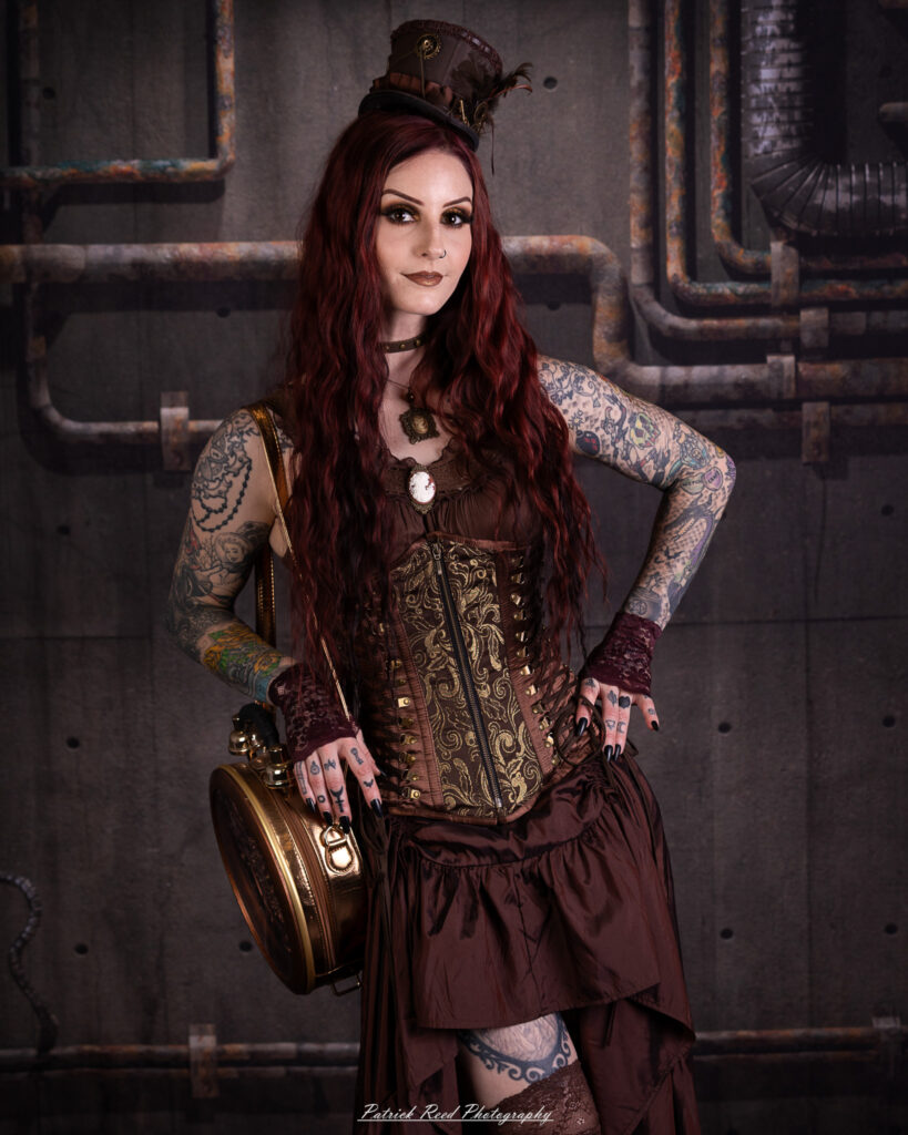 Portrait of a steampunk model named Minerva, taken on July 9, 2025. She is dressed in vintage-inspired futuristic attire with detailed accessories, capturing the essence of steampunk fashion.