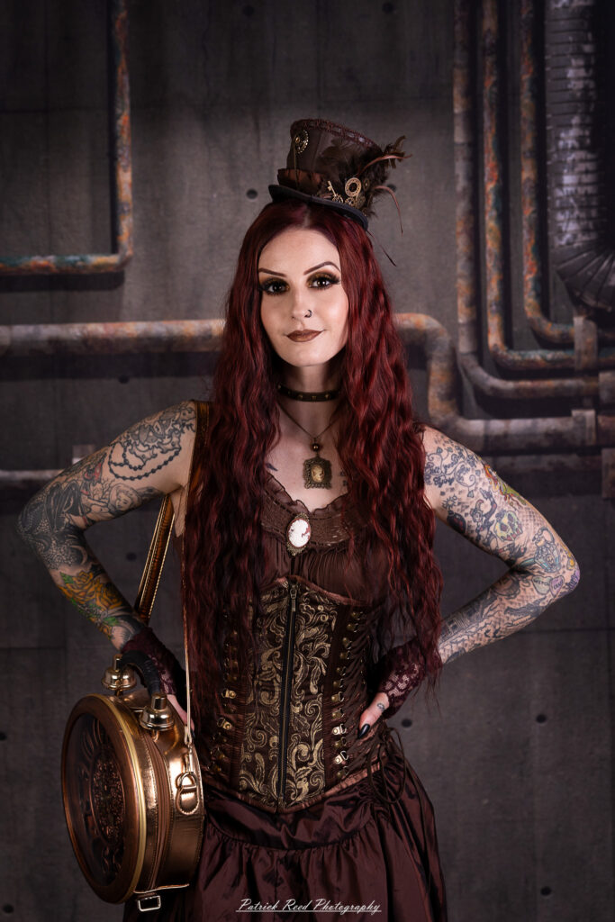 Portrait of a steampunk model named Minerva, taken on July 9, 2025. She is dressed in vintage-inspired futuristic attire with detailed accessories, capturing the essence of steampunk fashion.