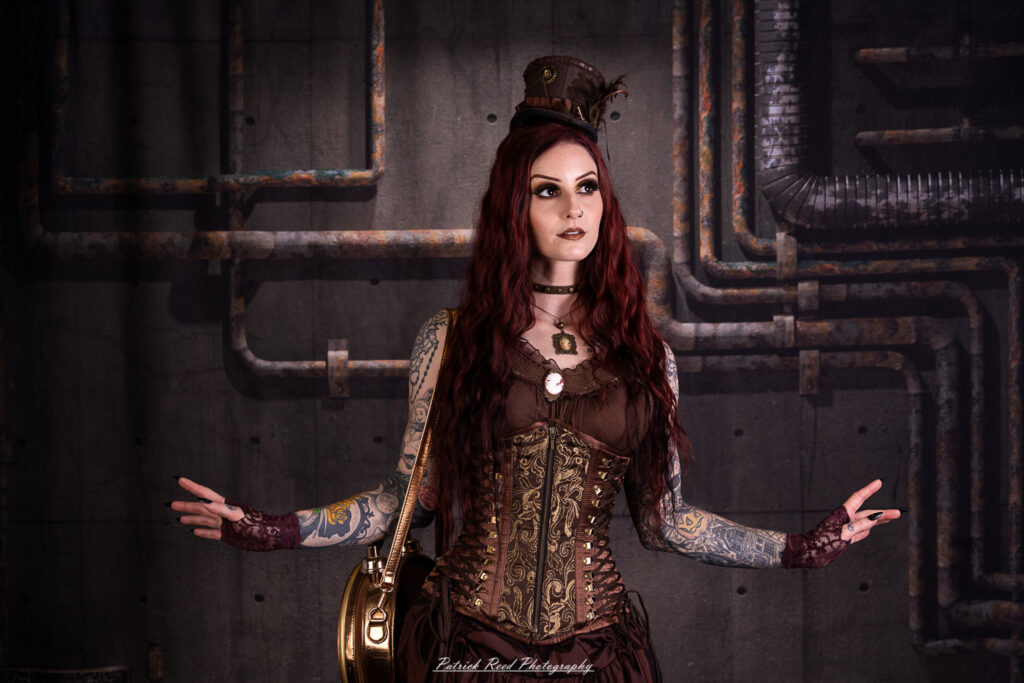 Portrait of a steampunk model named Minerva, taken on July 9, 2025. She is dressed in vintage-inspired futuristic attire with detailed accessories, capturing the essence of steampunk fashion.