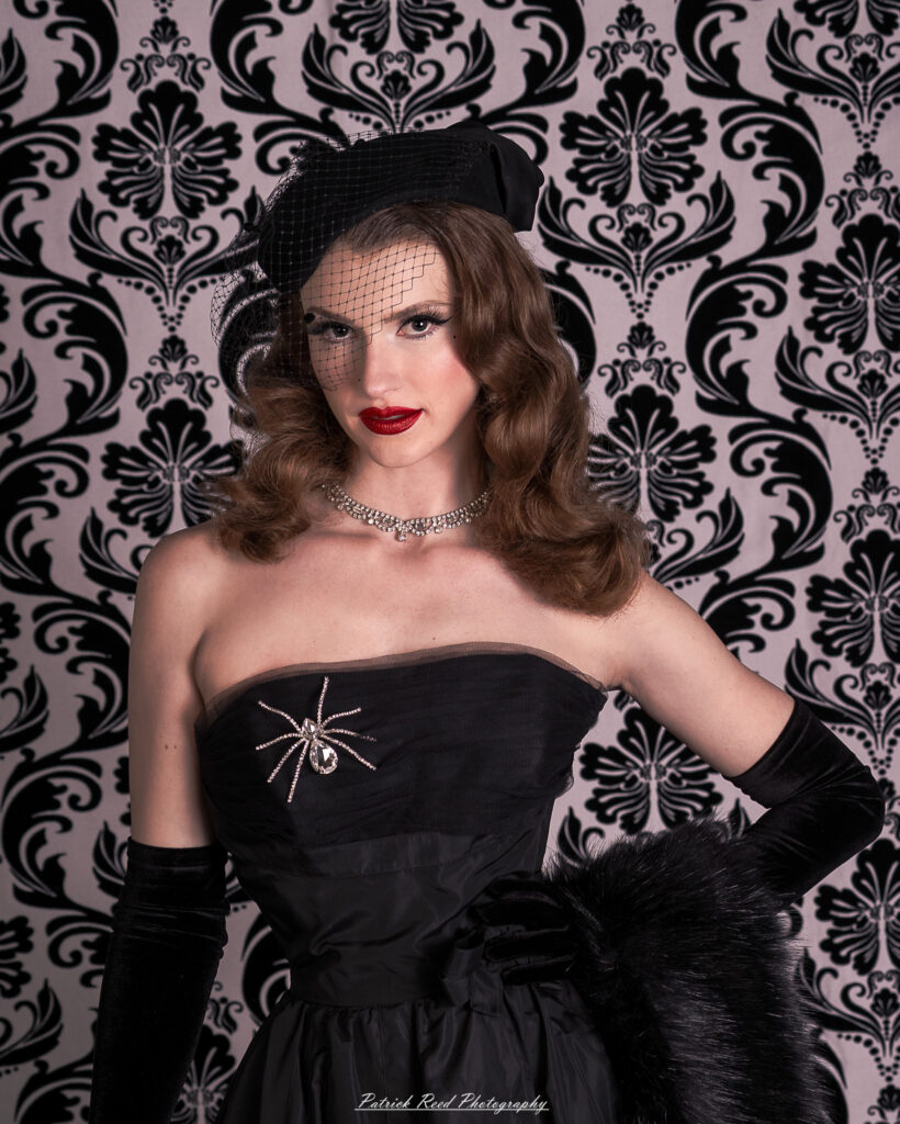 Portrait of a model named Noell dressed in vintage Hollywood glamour style, taken on July 16, 2025.