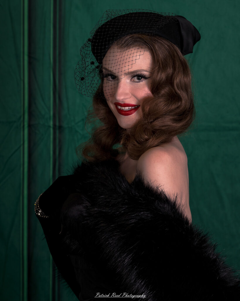 Portrait of a model named Noell dressed in vintage Hollywood glamour style, taken on July 16, 2025.