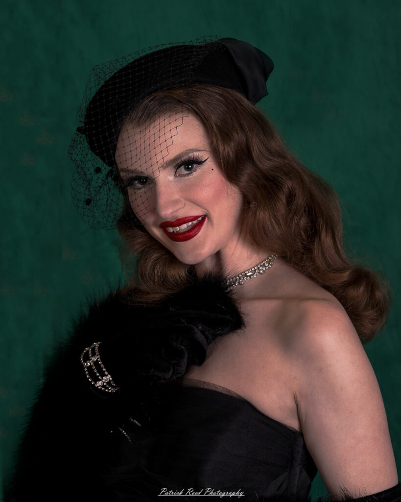Portrait of a model named Noell dressed in vintage Hollywood glamour style, taken on July 16, 2025.
