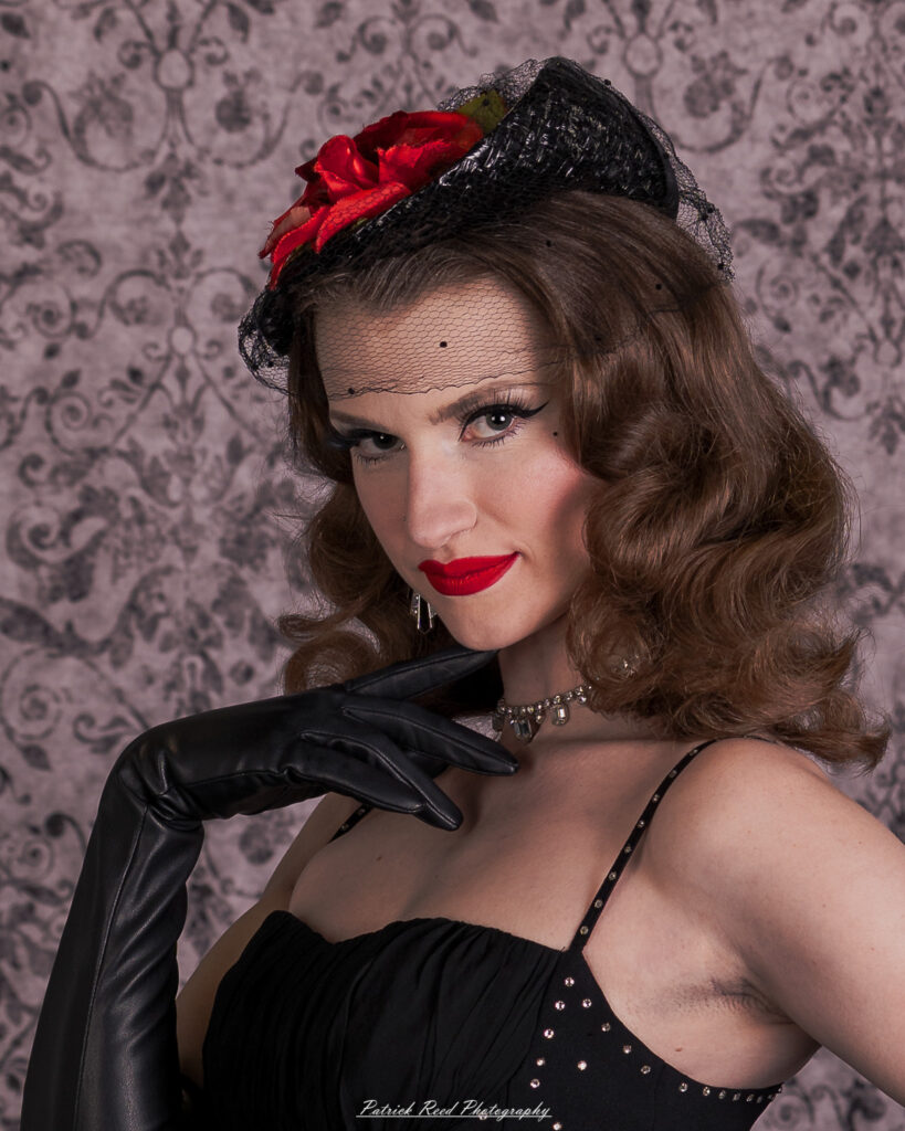 Portrait of a model named Noell dressed in vintage Hollywood glamour style, taken on July 16, 2025.