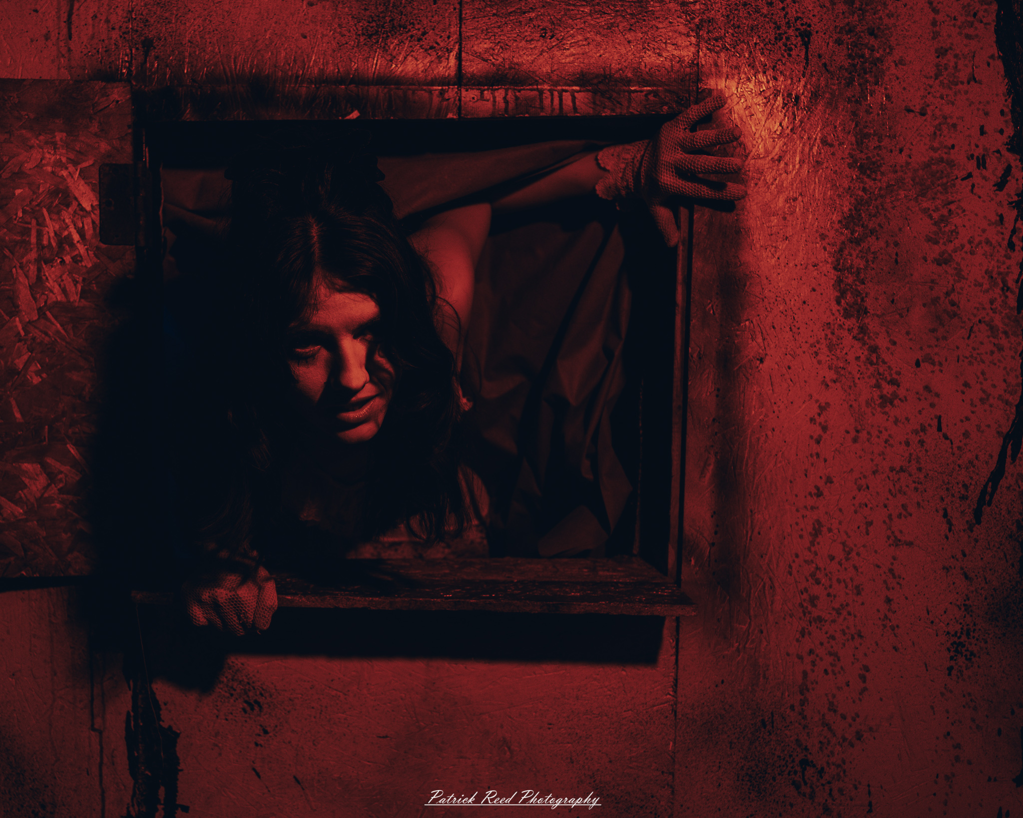 Spooky night photography at Scarefest Haunted Park in Michigan, featuring eerie lighting, haunted attractions, and Halloween-themed performers.