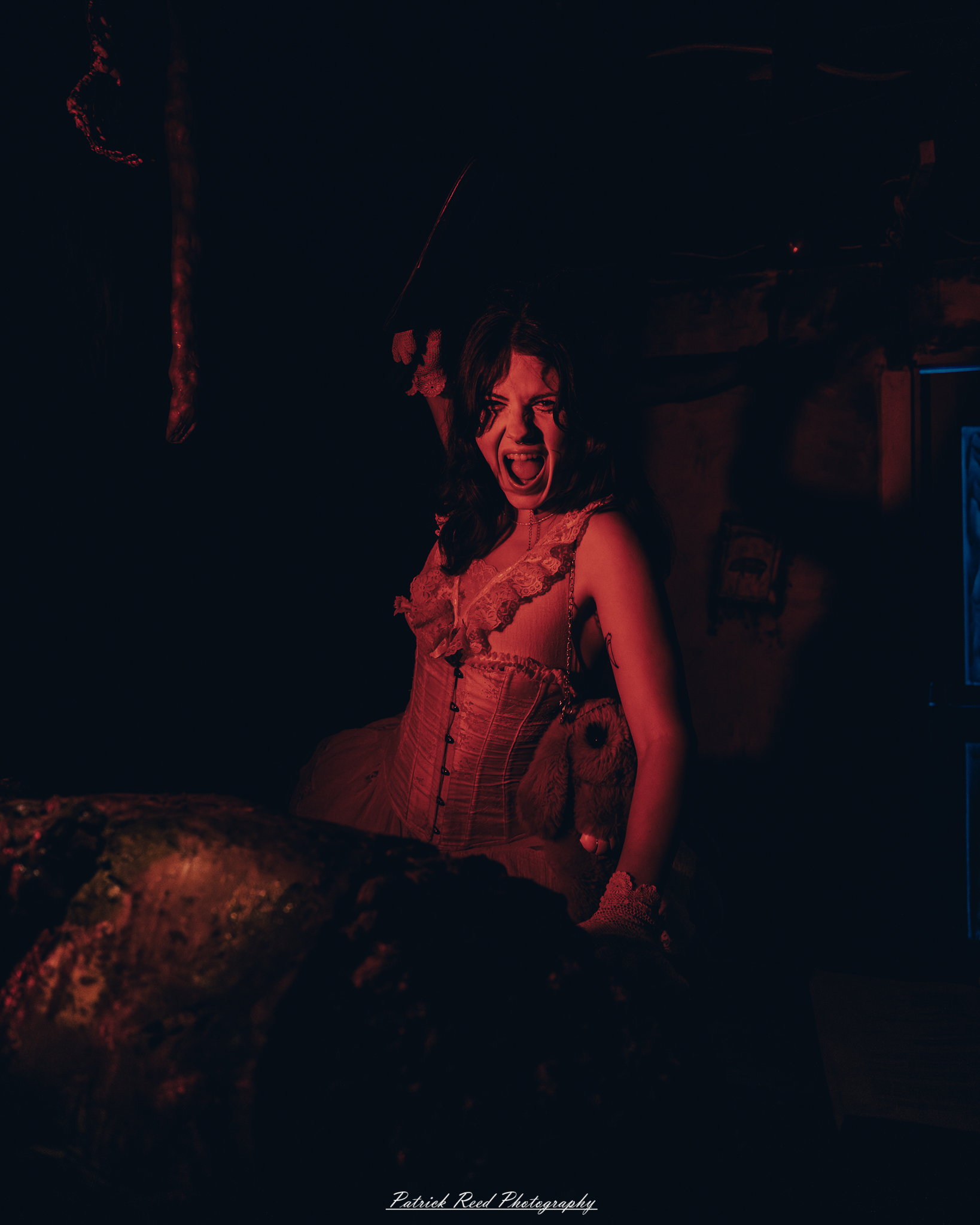 Spooky night photography at Scarefest Haunted Park in Michigan, featuring eerie lighting, haunted attractions, and Halloween-themed performers.