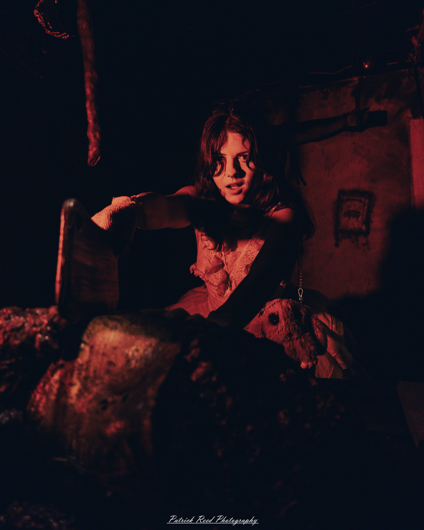 Spooky night photography at Scarefest Haunted Park in Michigan, featuring eerie lighting, haunted attractions, and Halloween-themed performers.