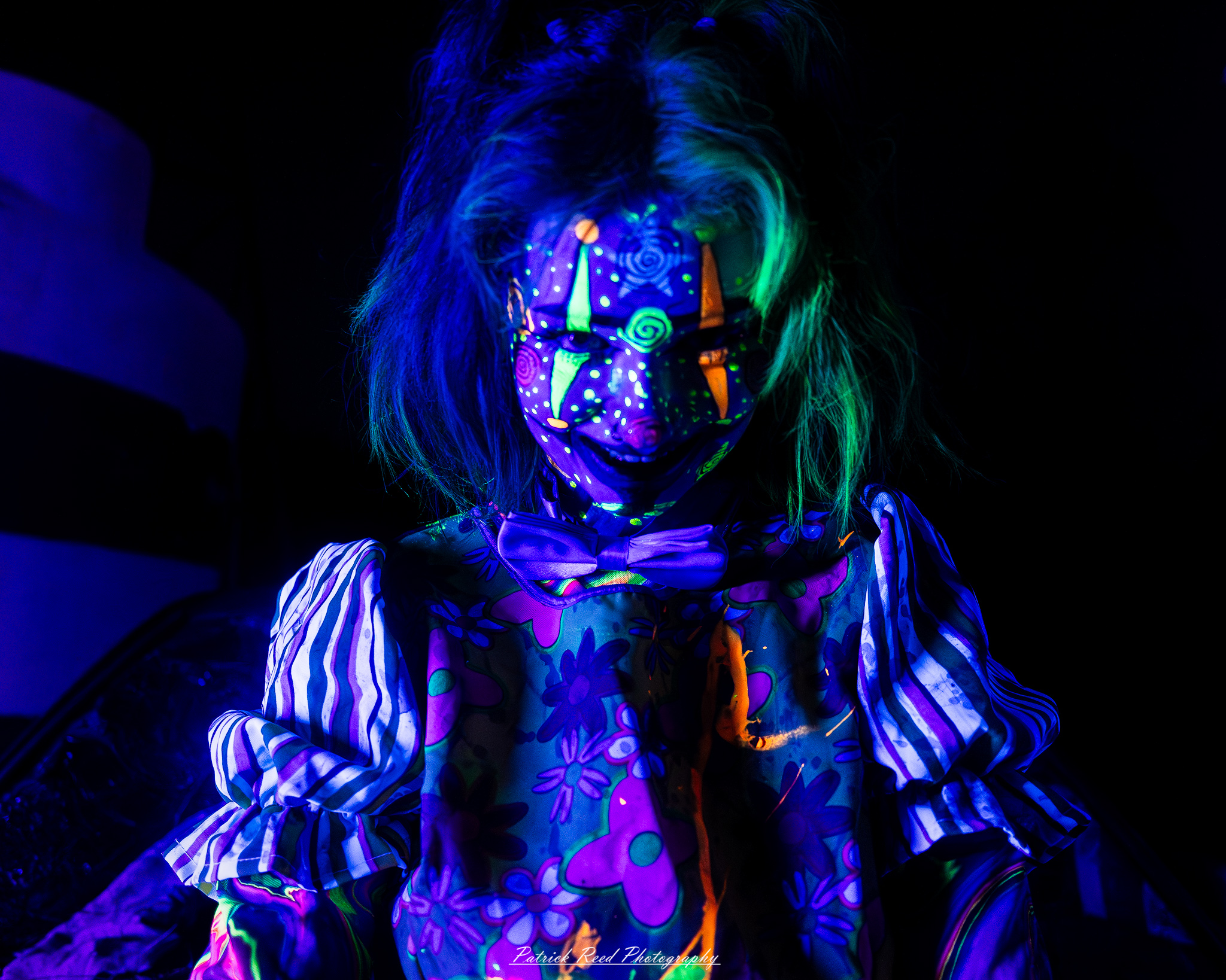 Spooky night photography at Scarefest Haunted Park in Michigan, featuring eerie lighting, haunted attractions, and Halloween-themed performers.