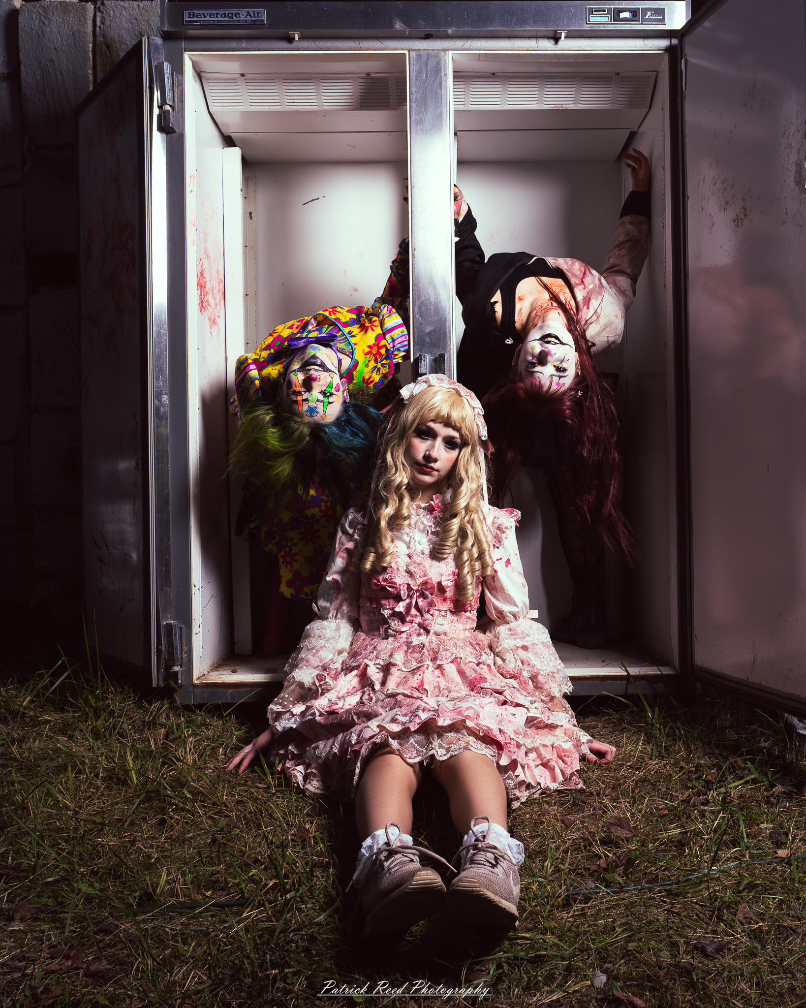 Spooky night photography at Scarefest Haunted Park in Michigan, featuring eerie lighting, haunted attractions, and Halloween-themed performers.