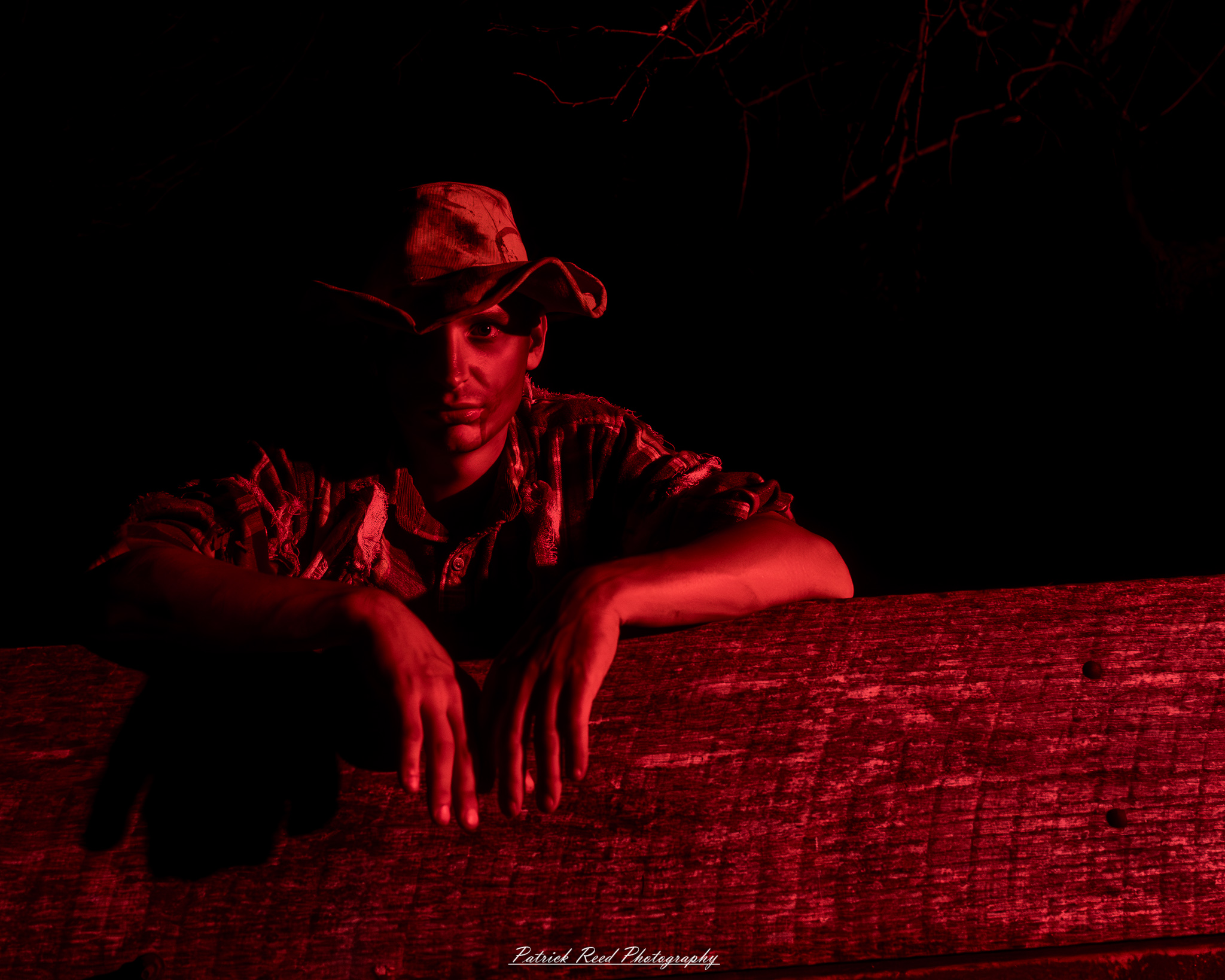 Spooky night photography at Scarefest Haunted Park in Michigan, featuring eerie lighting, haunted attractions, and Halloween-themed performers.