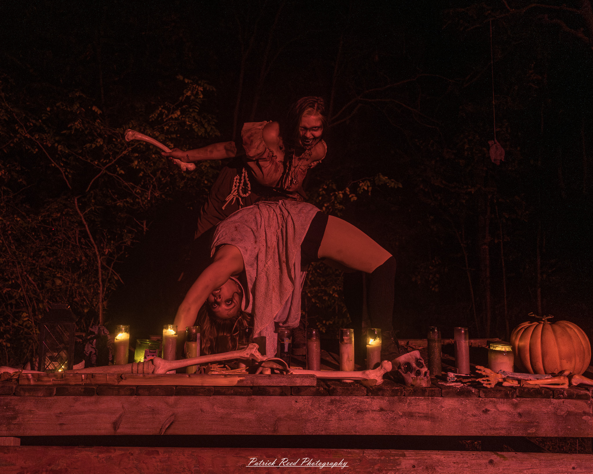 Spooky night photography at Scarefest Haunted Park in Michigan, featuring eerie lighting, haunted attractions, and Halloween-themed performers.