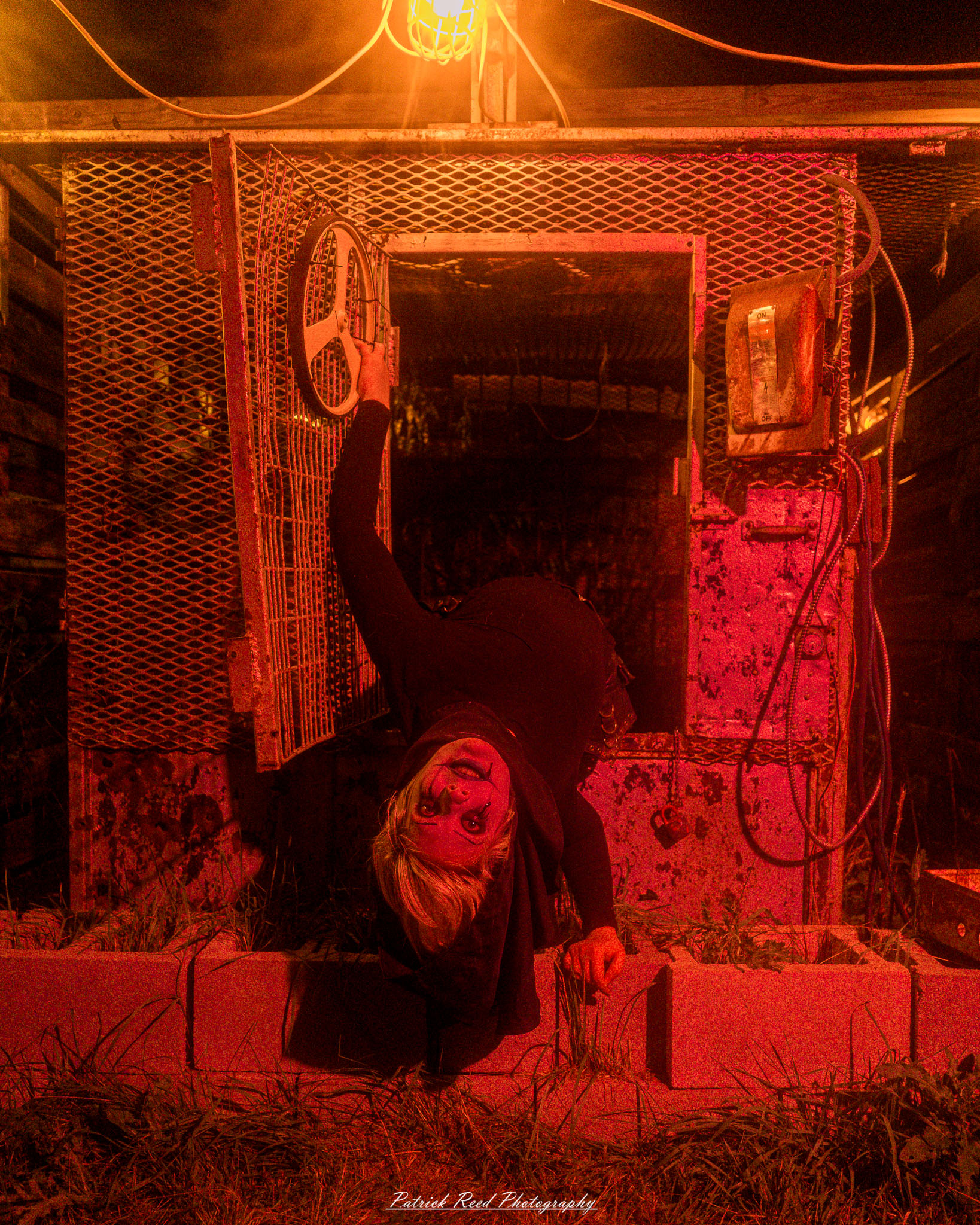 Spooky night photography at Scarefest Haunted Park in Michigan, featuring eerie lighting, haunted attractions, and Halloween-themed performers.