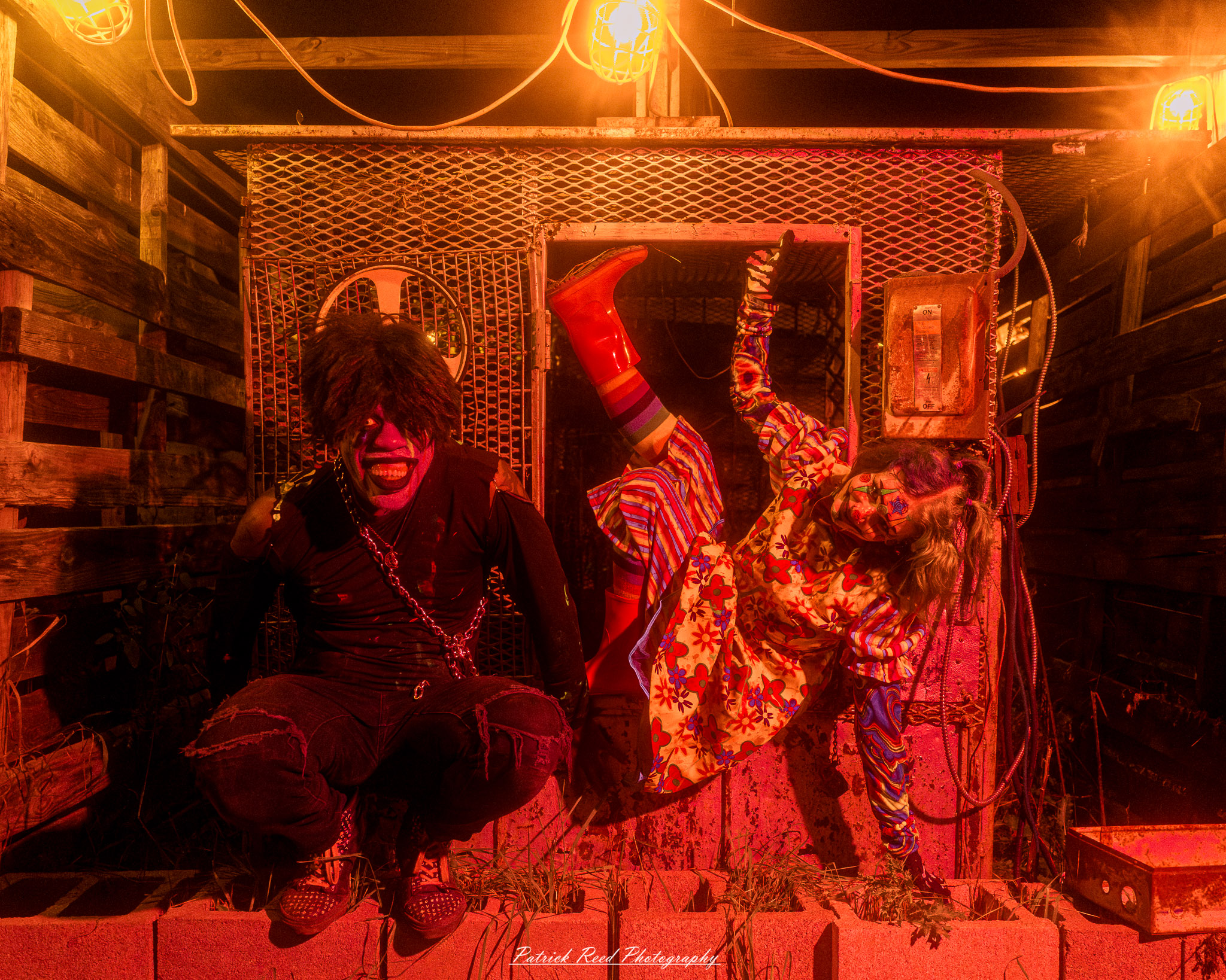 Spooky night photography at Scarefest Haunted Park in Michigan, featuring eerie lighting, haunted attractions, and Halloween-themed performers.