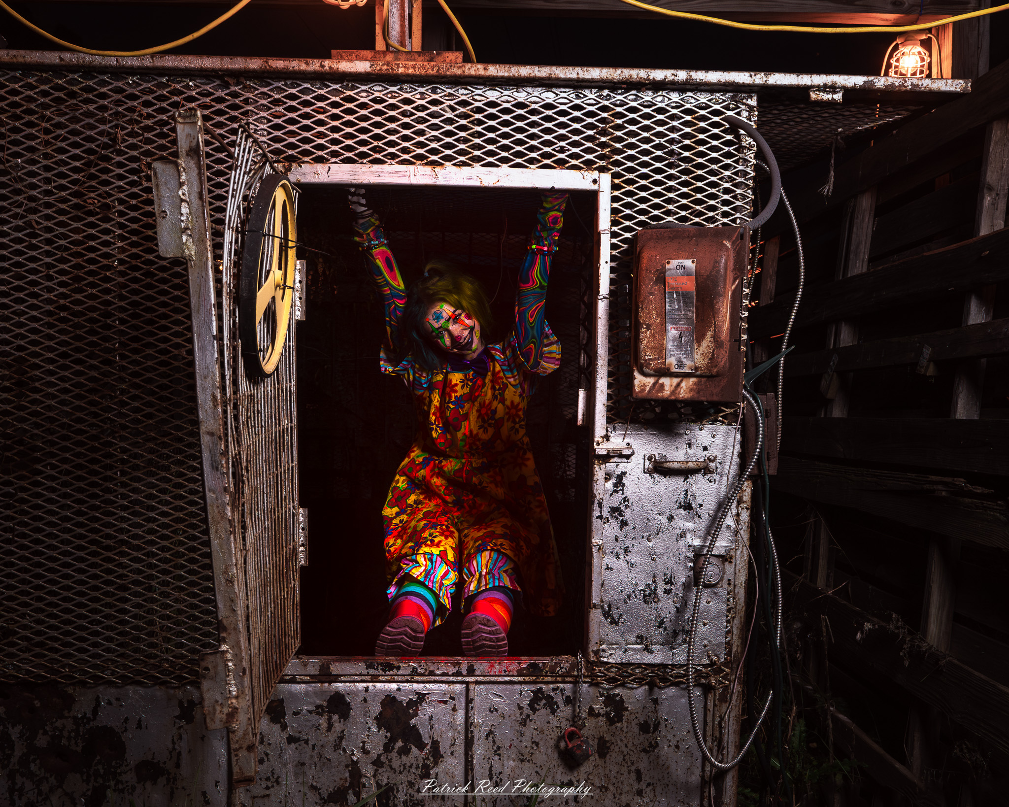 Spooky night photography at Scarefest Haunted Park in Michigan, featuring eerie lighting, haunted attractions, and Halloween-themed performers.