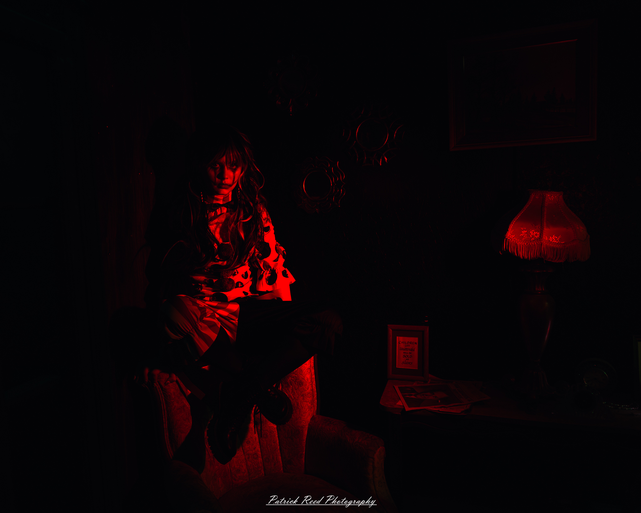 Spooky night photography at Scarefest Haunted Park in Michigan, featuring eerie lighting, haunted attractions, and Halloween-themed performers.