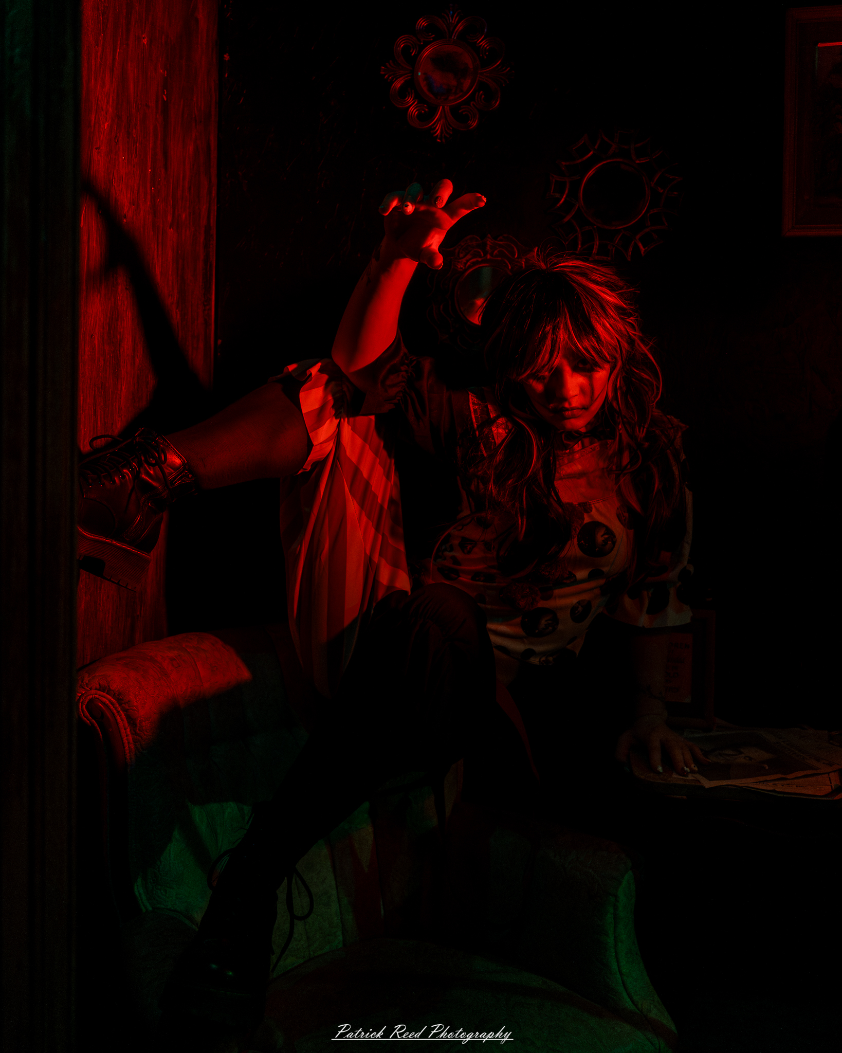 Spooky night photography at Scarefest Haunted Park in Michigan, featuring eerie lighting, haunted attractions, and Halloween-themed performers.