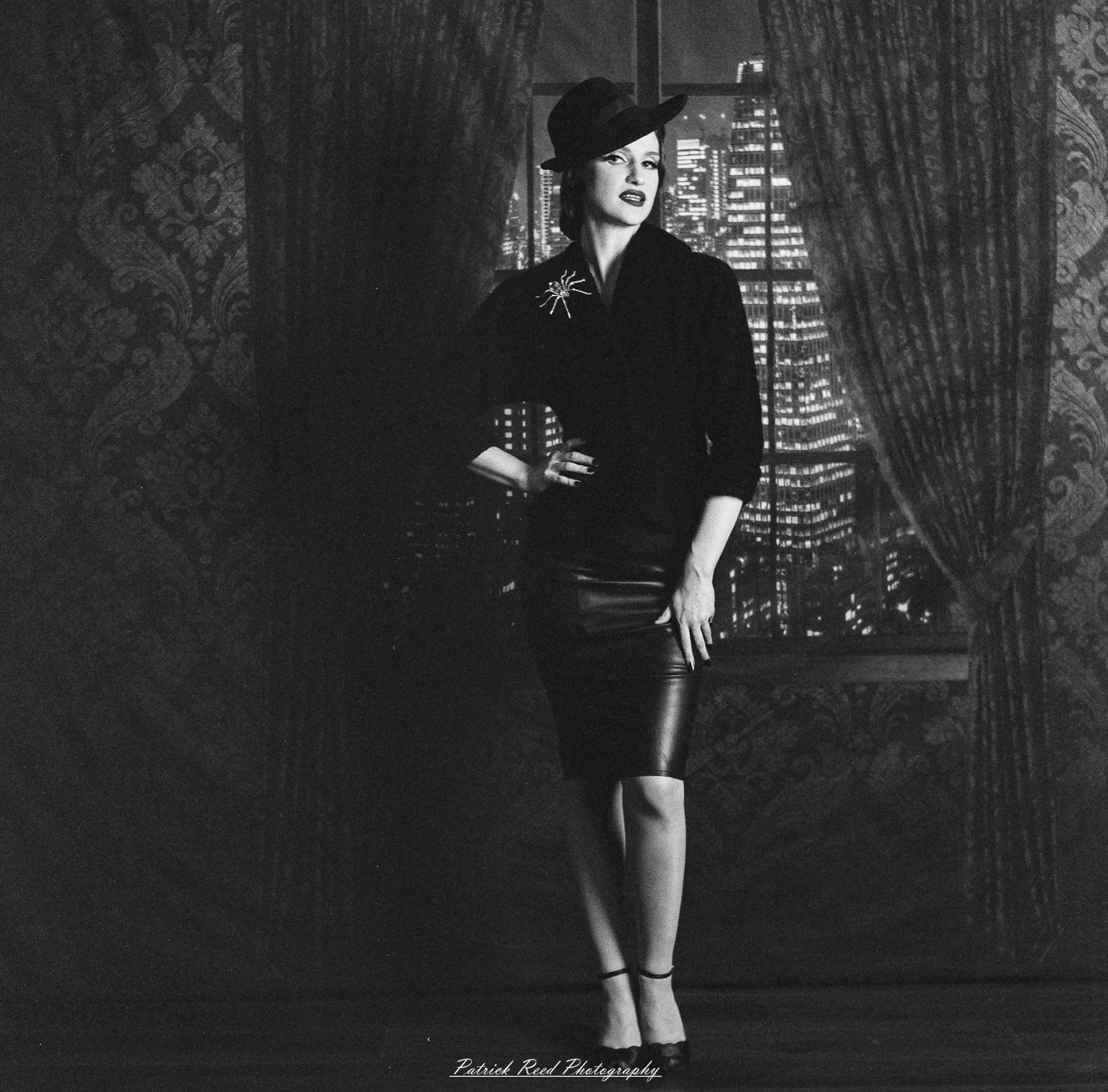 A studio portrait of a model named Noel, photographed on October 1, 2025, using a Mamiya C33 medium format film camera.