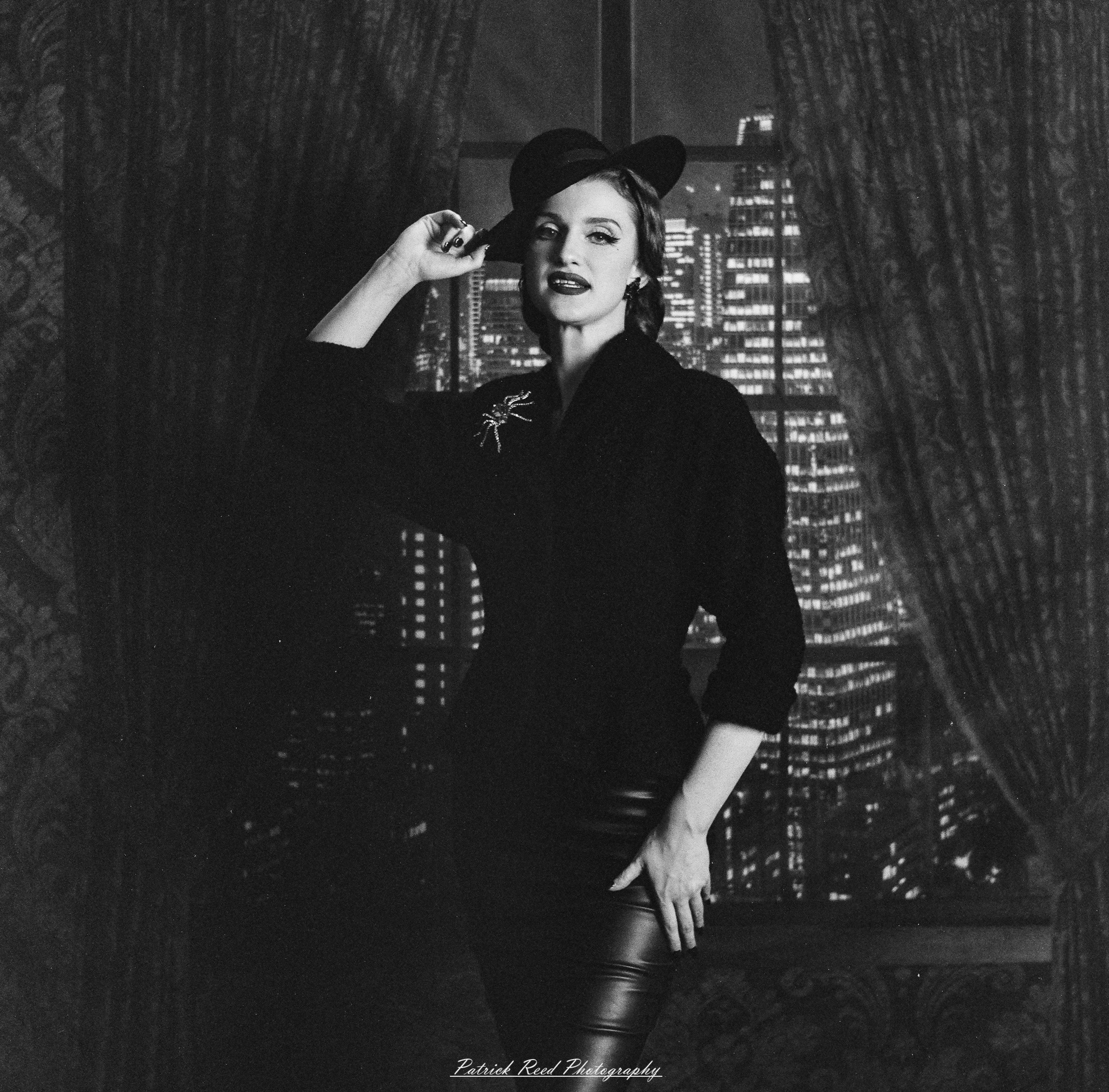 A studio portrait of a model named Noel, photographed on October 1, 2025, using a Mamiya C33 medium format film camera.