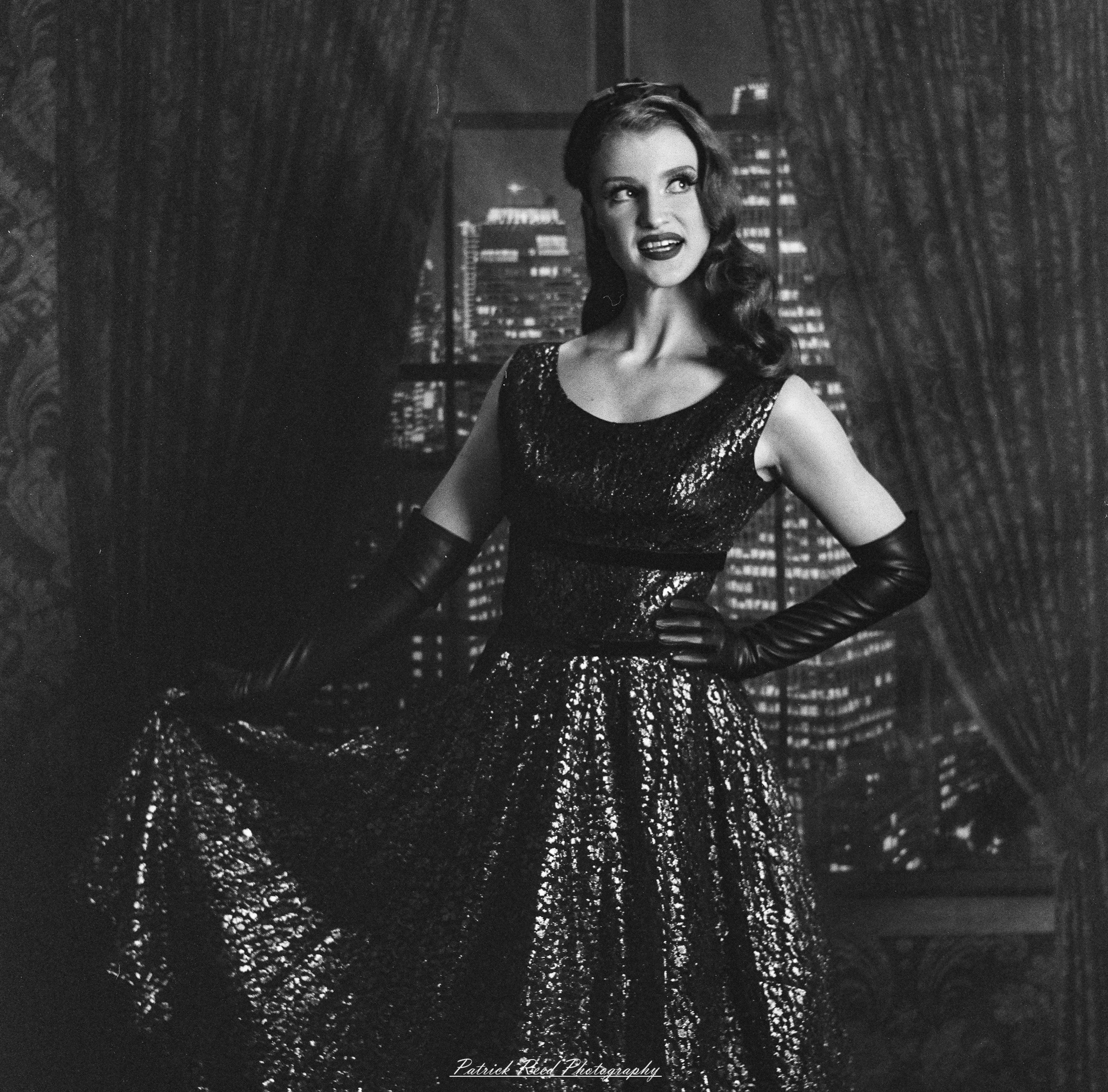 A studio portrait of a model named Noel, photographed on October 1, 2025, using a Mamiya C33 medium format film camera.