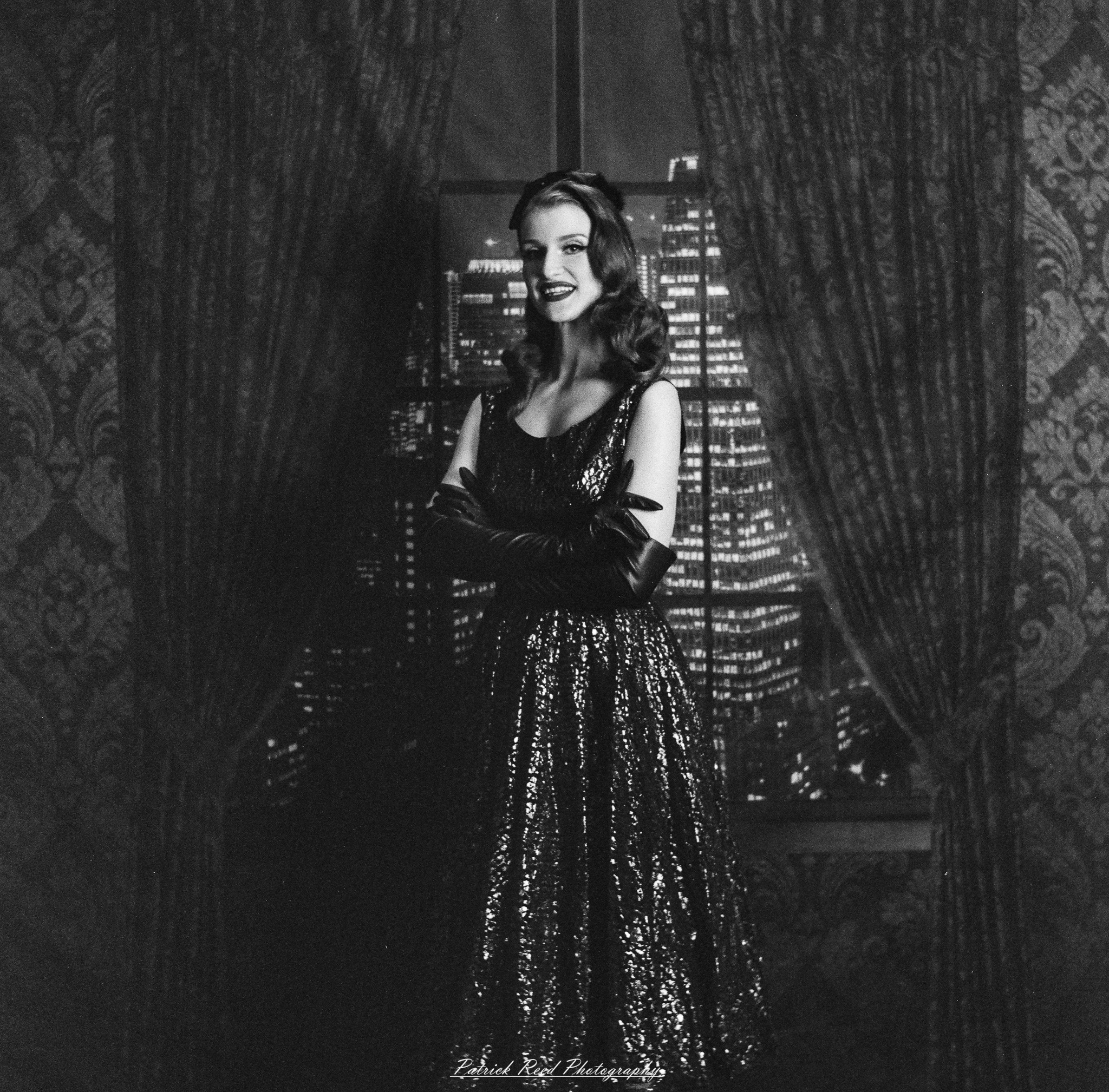 A studio portrait of a model named Noel, photographed on October 1, 2025, using a Mamiya C33 medium format film camera.