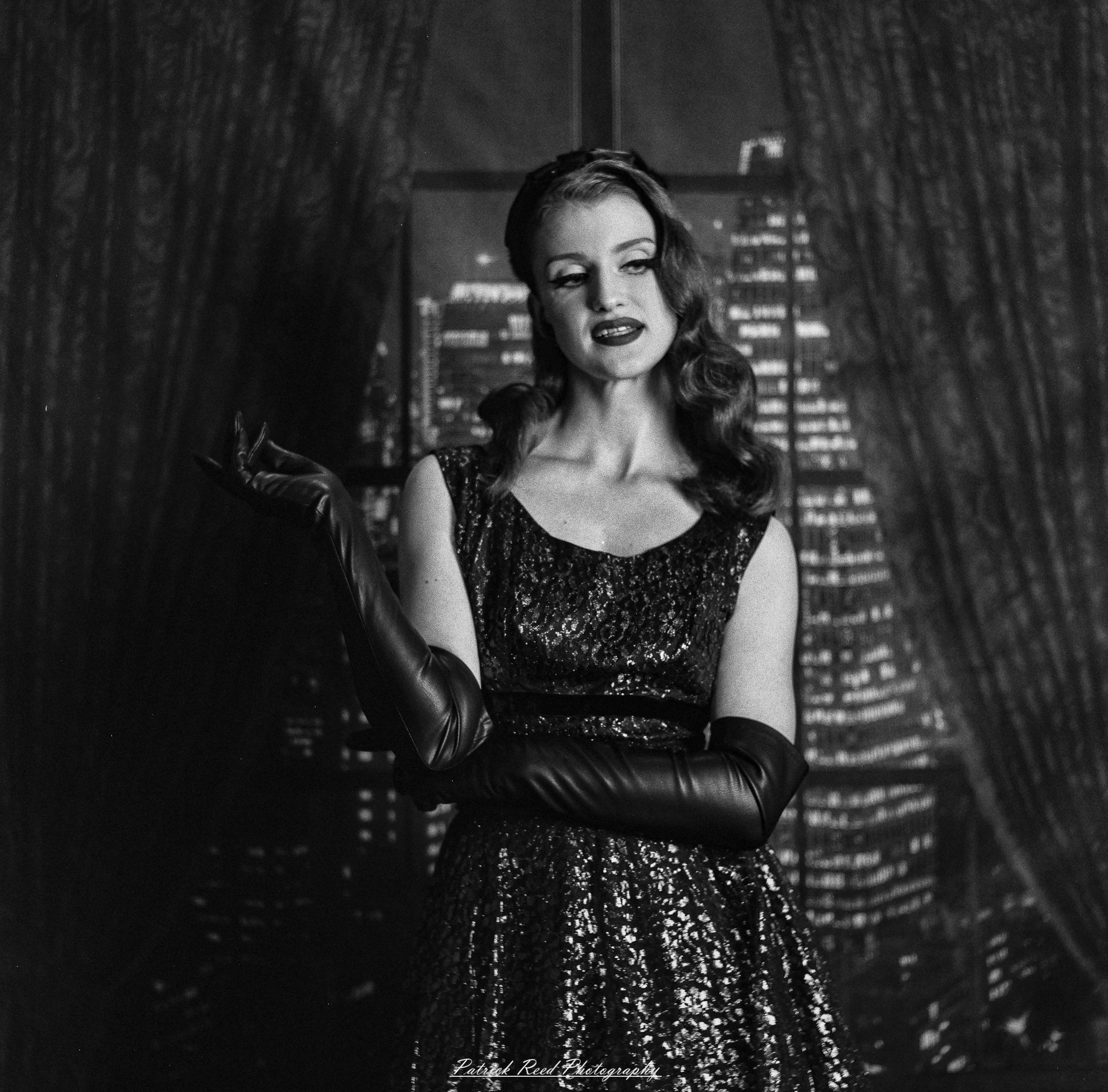 A studio portrait of a model named Noel, photographed on October 1, 2025, using a Mamiya C33 medium format film camera.