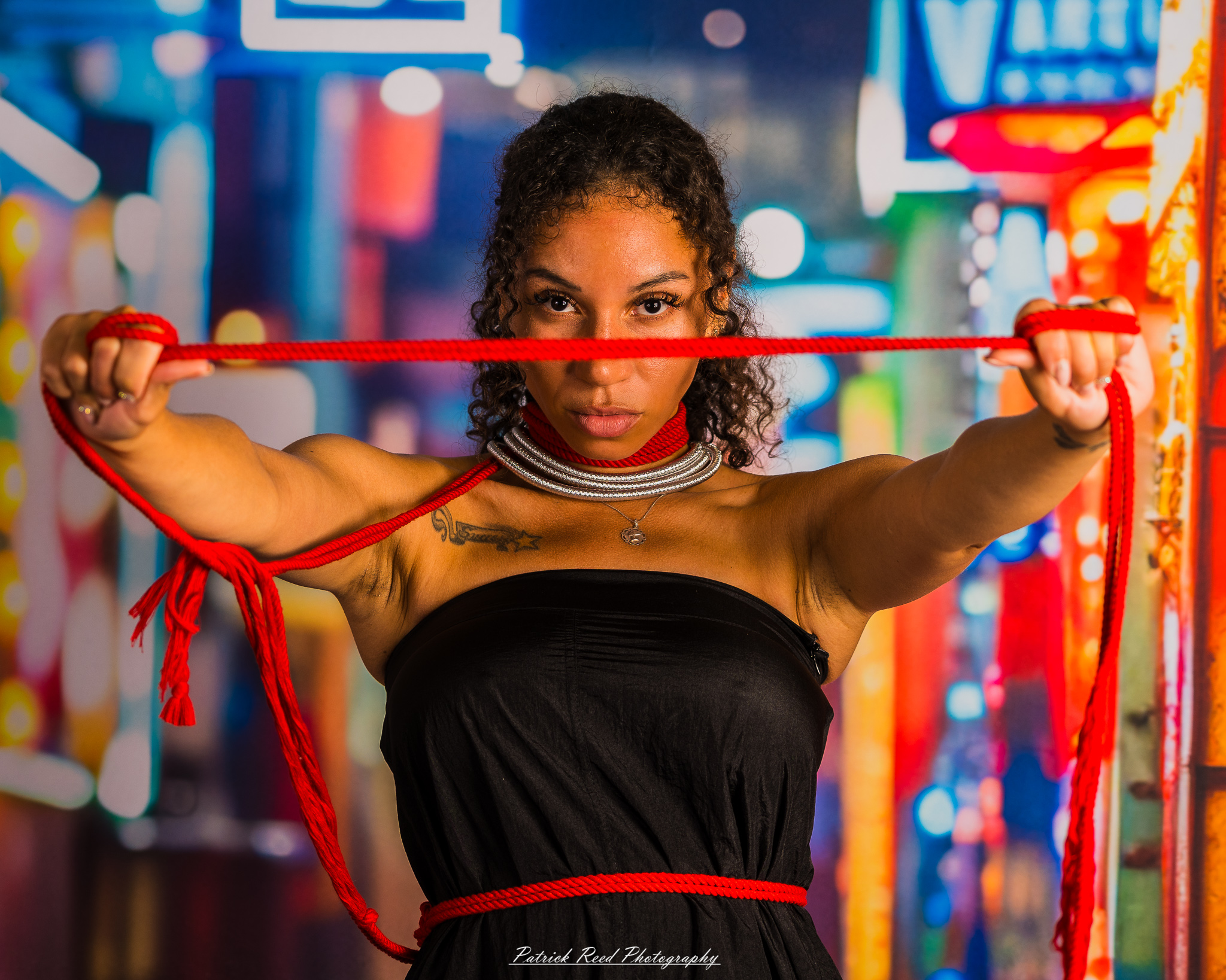 A portrait of a model named Sigh Bleu, photographed on September 24, 2025, featuring expressive posing and dramatic lighting in a studio setting.