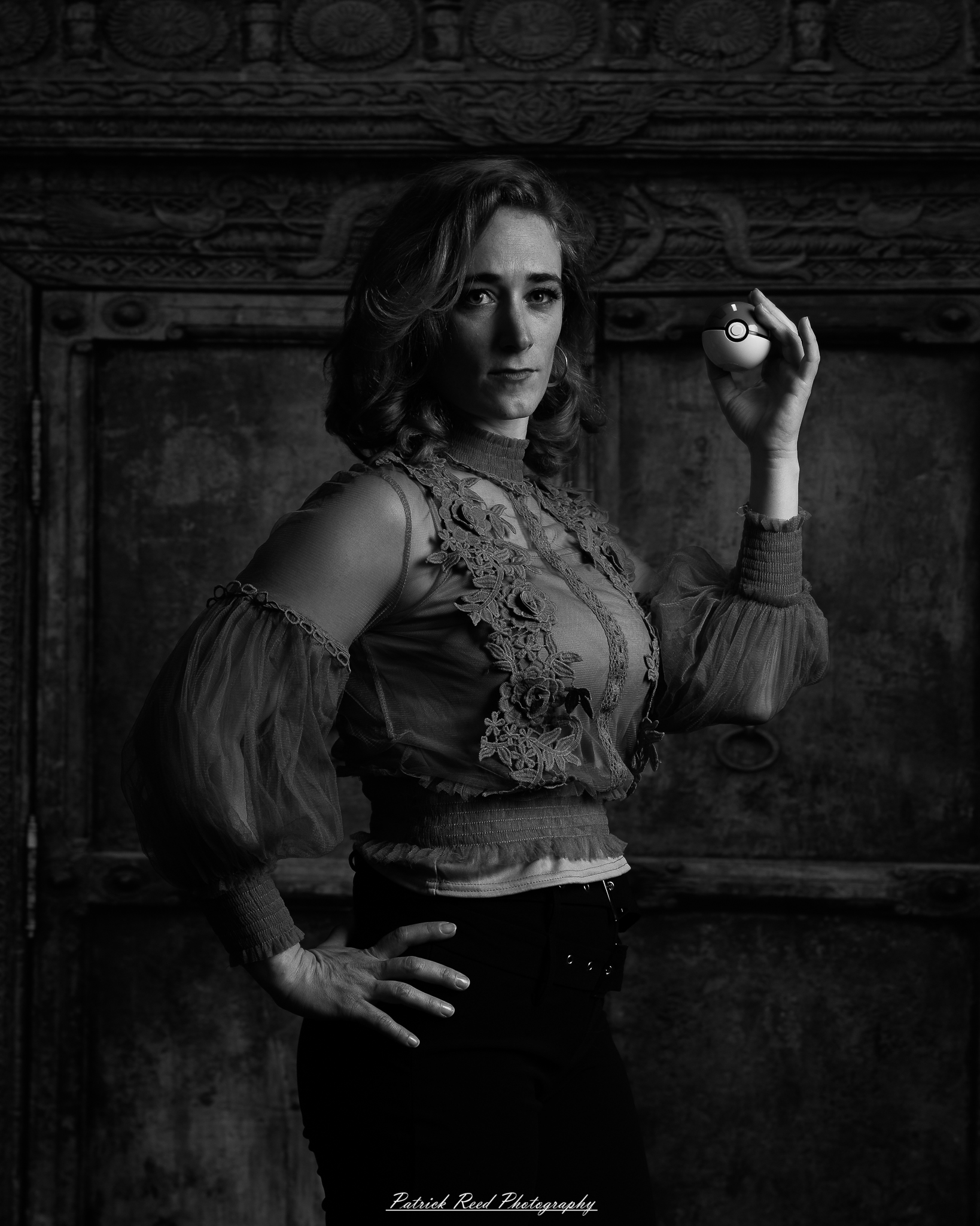 A fantasy-inspired portrait titled “Enchanted Valkyrie,” photographed on February 18, 2026. The model is styled in ethereal costume with dramatic lighting, evoking a powerful, otherworldly presence.