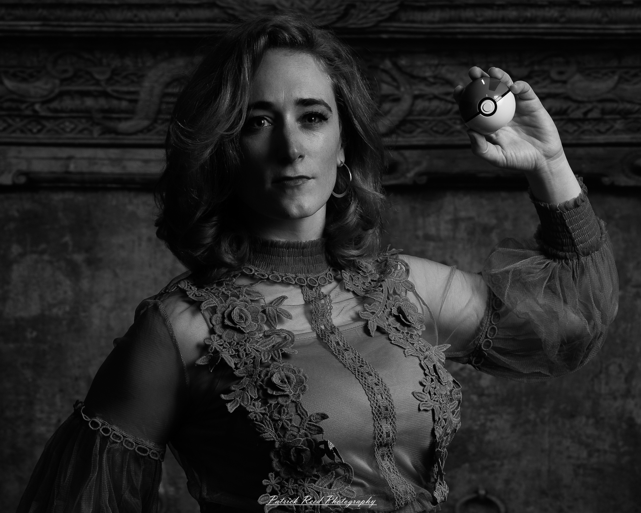 A fantasy-inspired portrait titled “Enchanted Valkyrie,” photographed on February 18, 2026. The model is styled in ethereal costume with dramatic lighting, evoking a powerful, otherworldly presence.