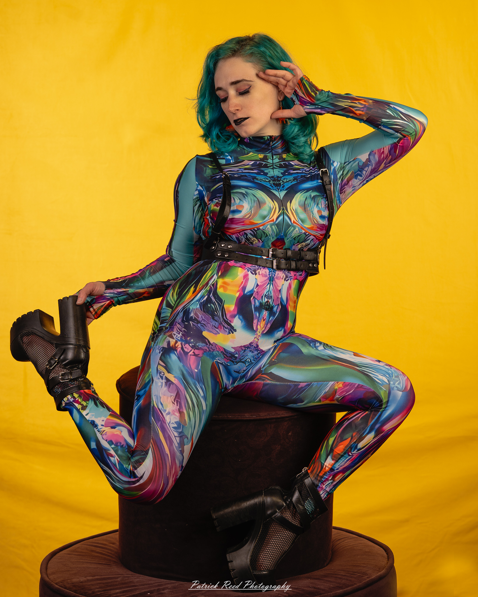 A fantasy-inspired portrait titled “Enchanted Valkyrie,” photographed on February 18, 2026. The model is styled in ethereal costume with dramatic lighting, evoking a powerful, otherworldly presence.