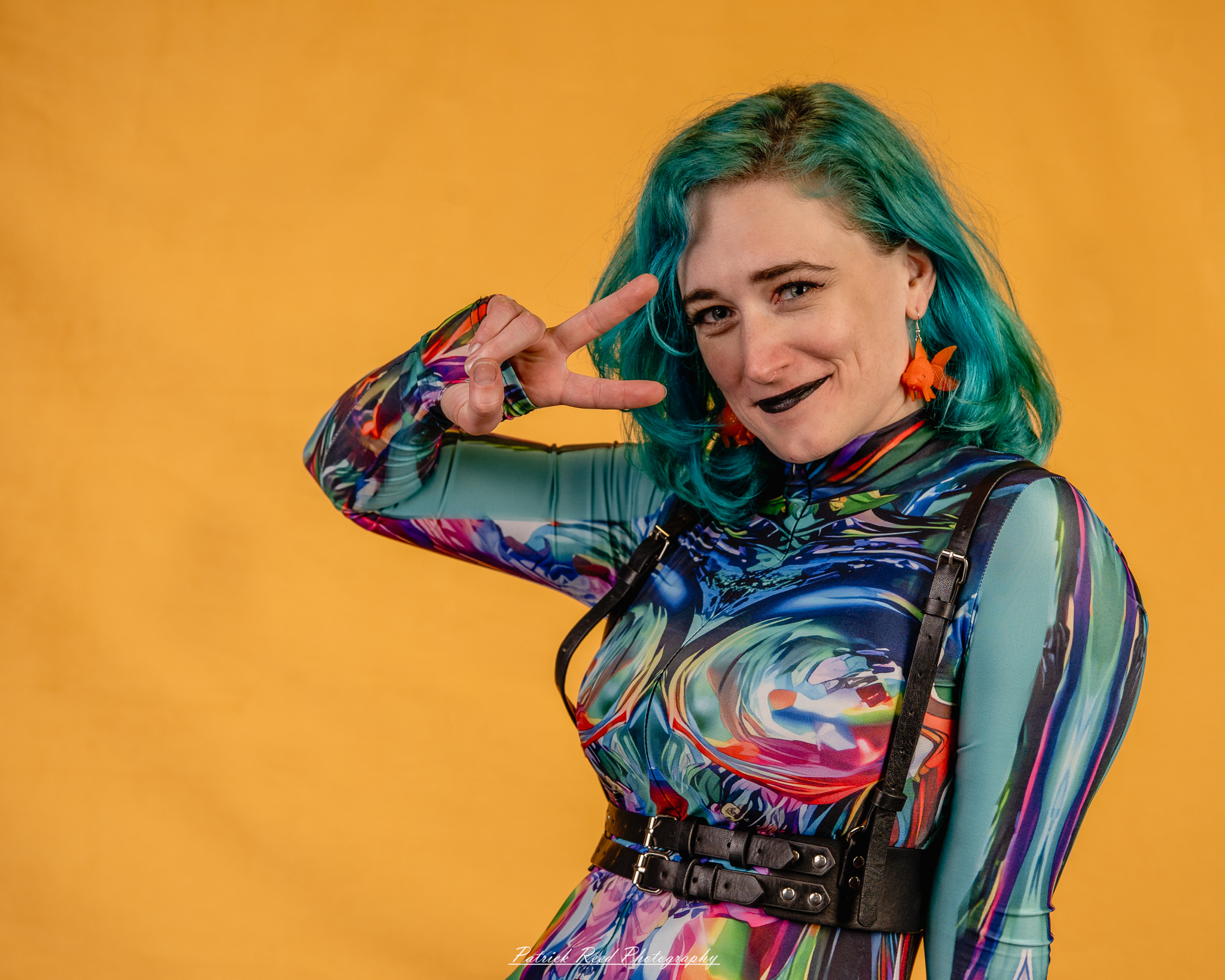 A fantasy-inspired portrait titled “Enchanted Valkyrie,” photographed on February 18, 2026. The model is styled in ethereal costume with dramatic lighting, evoking a powerful, otherworldly presence.