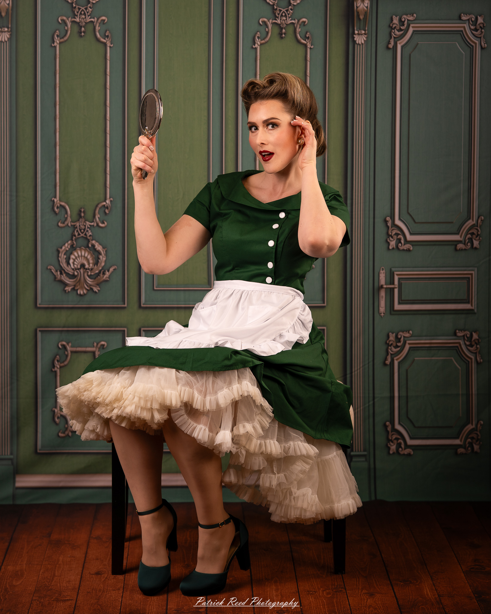 “Soft yet directional lighting portrait with a retro green dress and classic hairstyle”