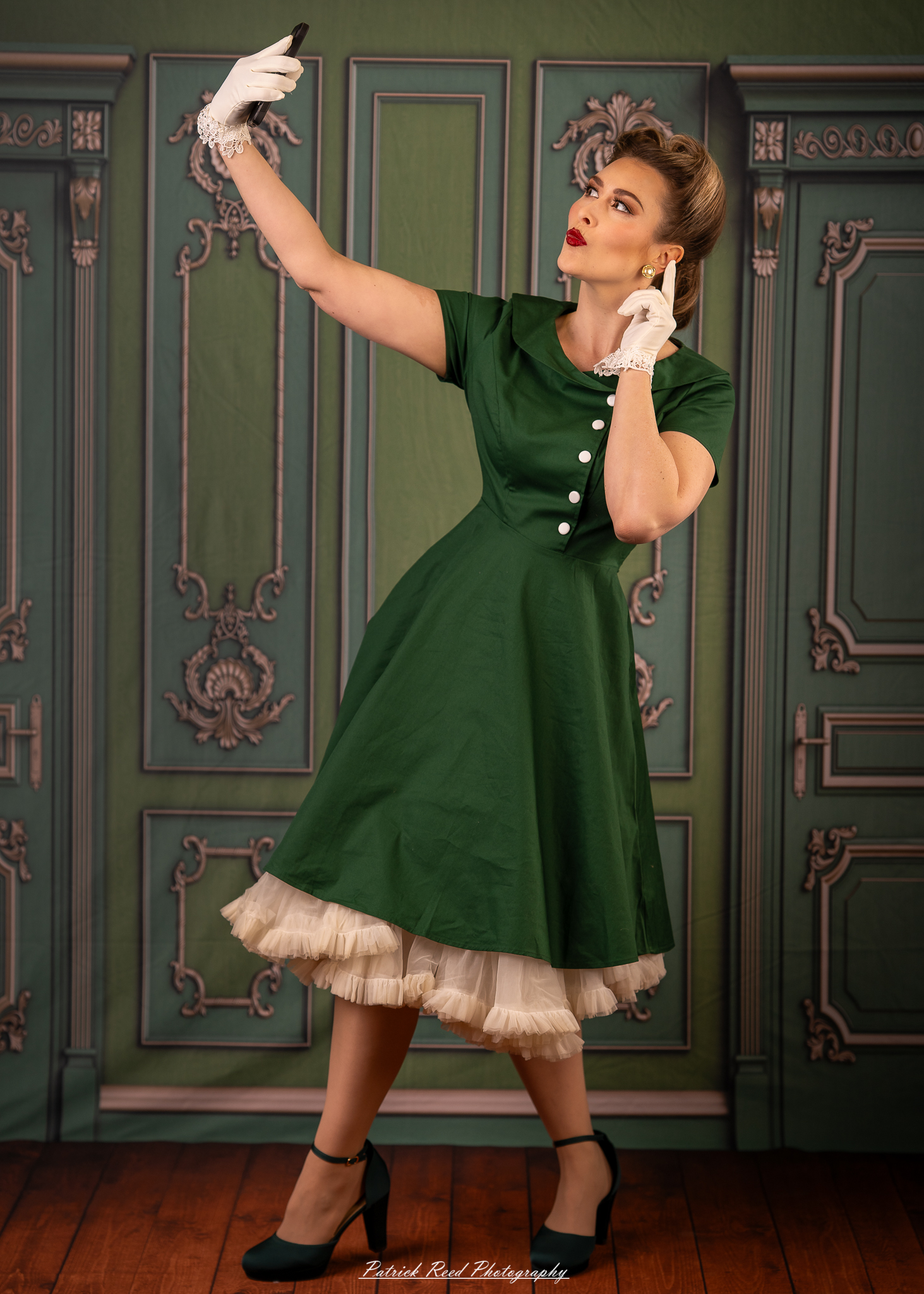 “Soft yet directional lighting portrait with a retro green dress and classic hairstyle”