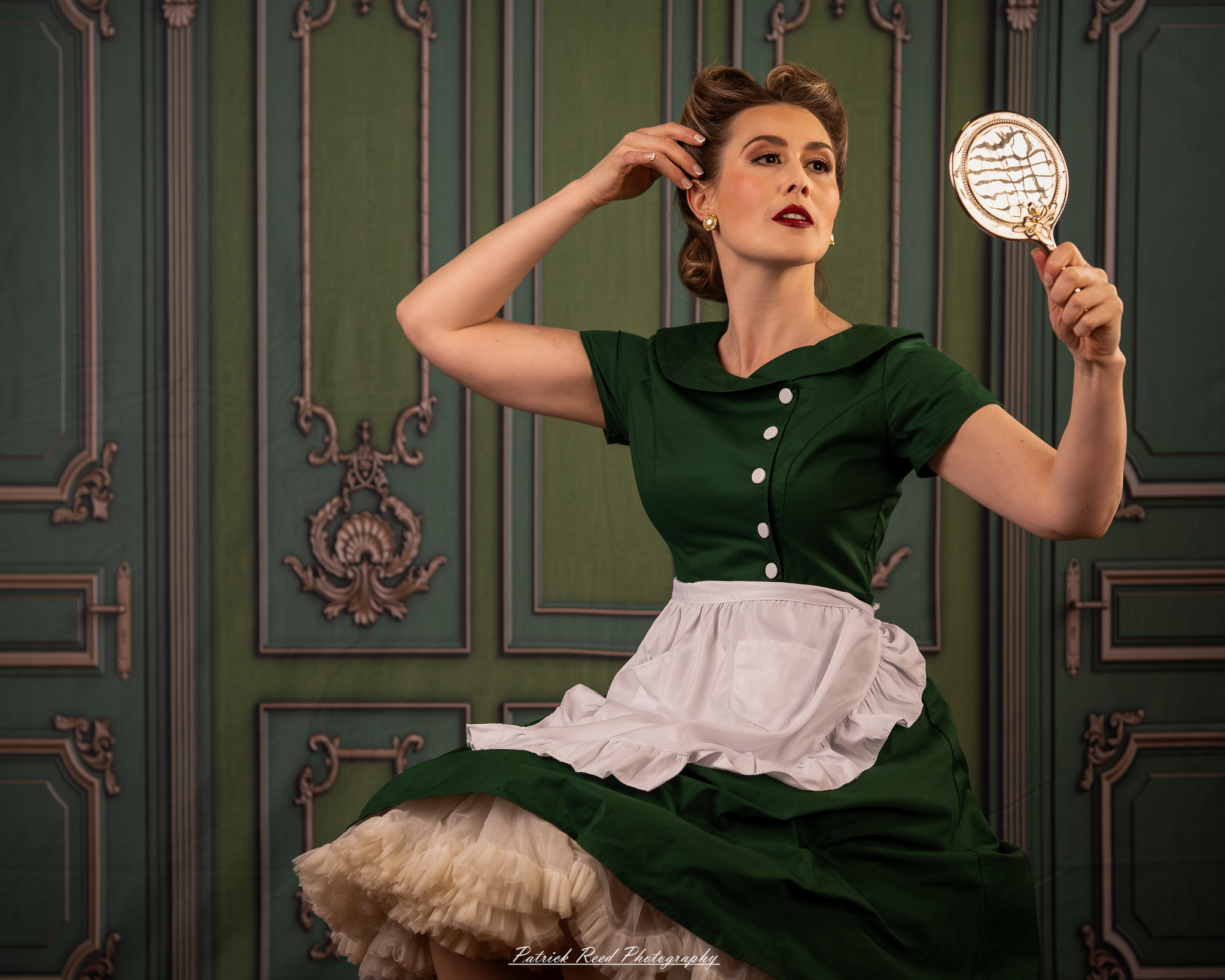 “Soft yet directional lighting portrait with a retro green dress and classic hairstyle”