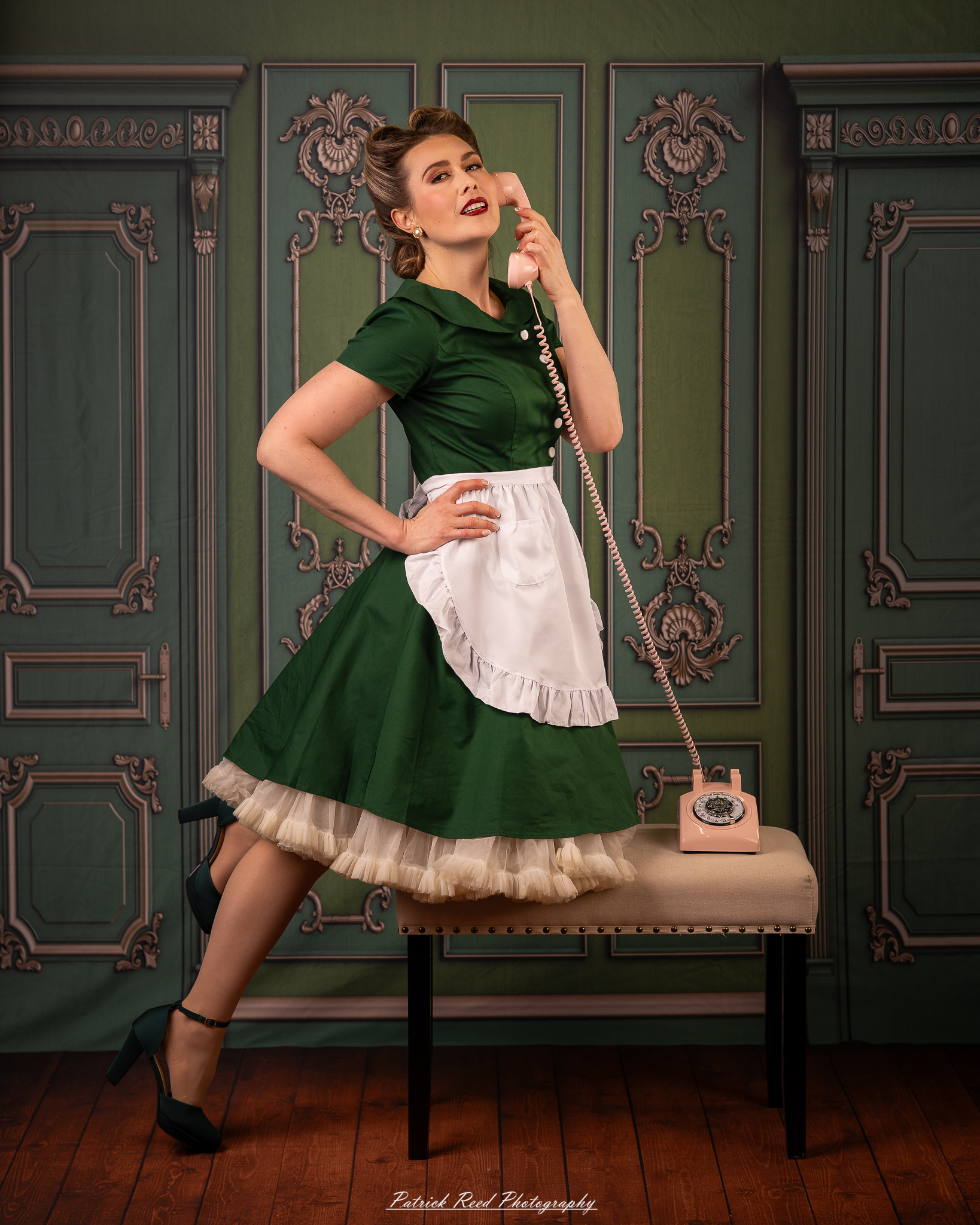 “Soft yet directional lighting portrait with a retro green dress and classic hairstyle”