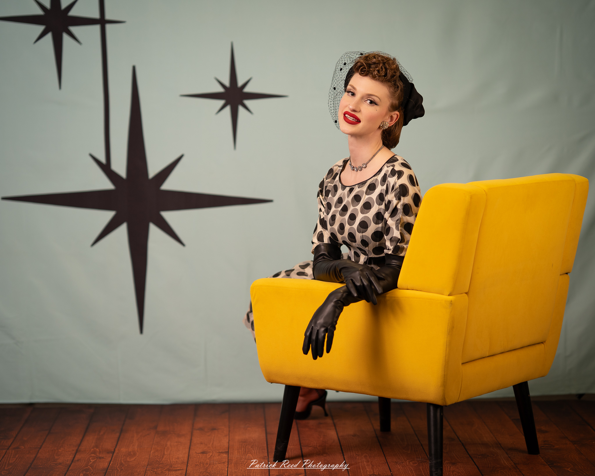 A retro-inspired portrait series of a model named Noelle photographed on March 13, 2026, featuring mid-century fashion styling, vintage hairstyles, colorful studio sets, and dramatic editorial lighting.